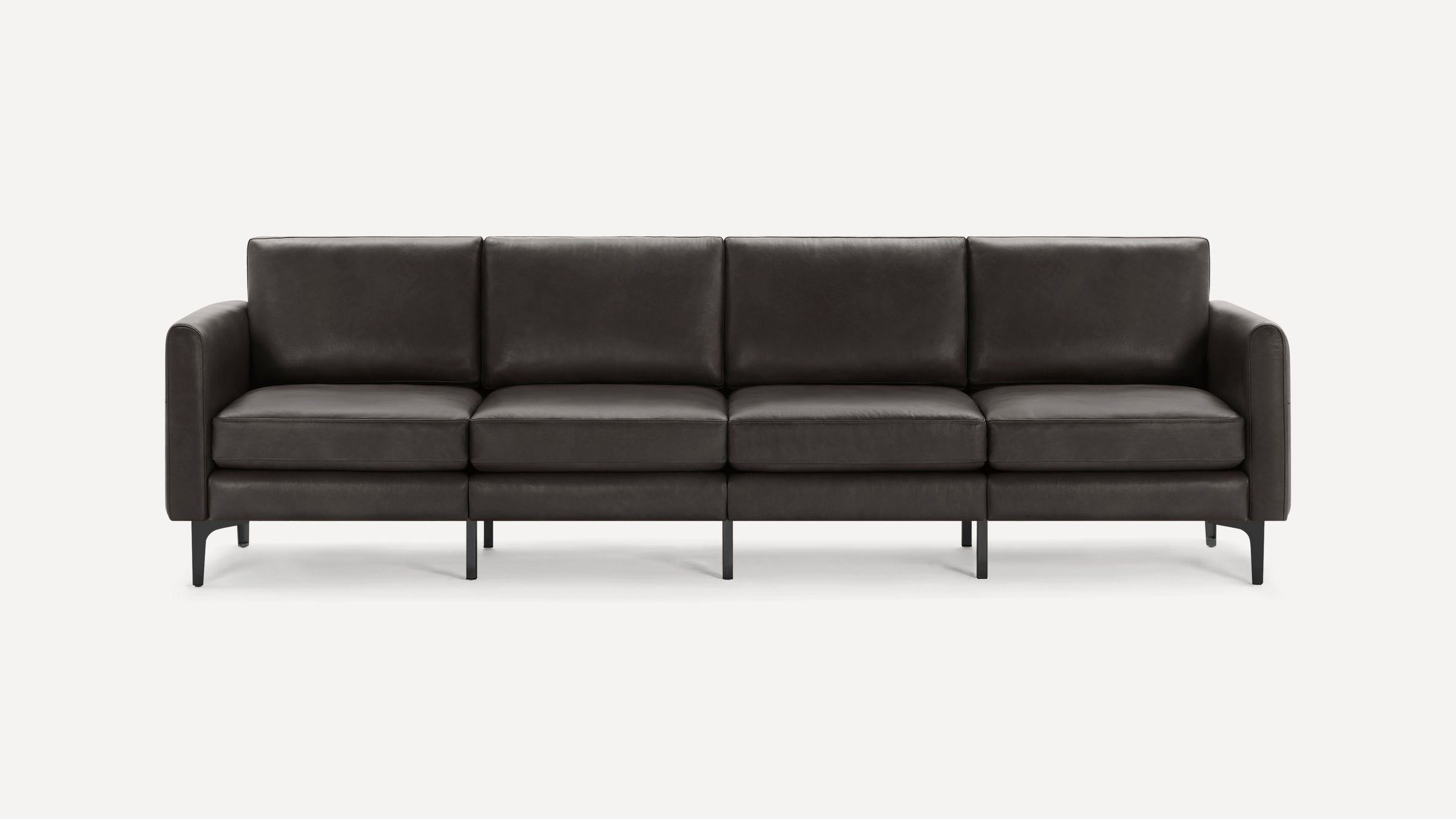 Modern four-seater dark gray leather sofa with sleek black metal legs and straight armrests on a plain white background.