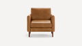 Front view of a mid-century modern caramel brown leather armchair with wooden legs on a white background.