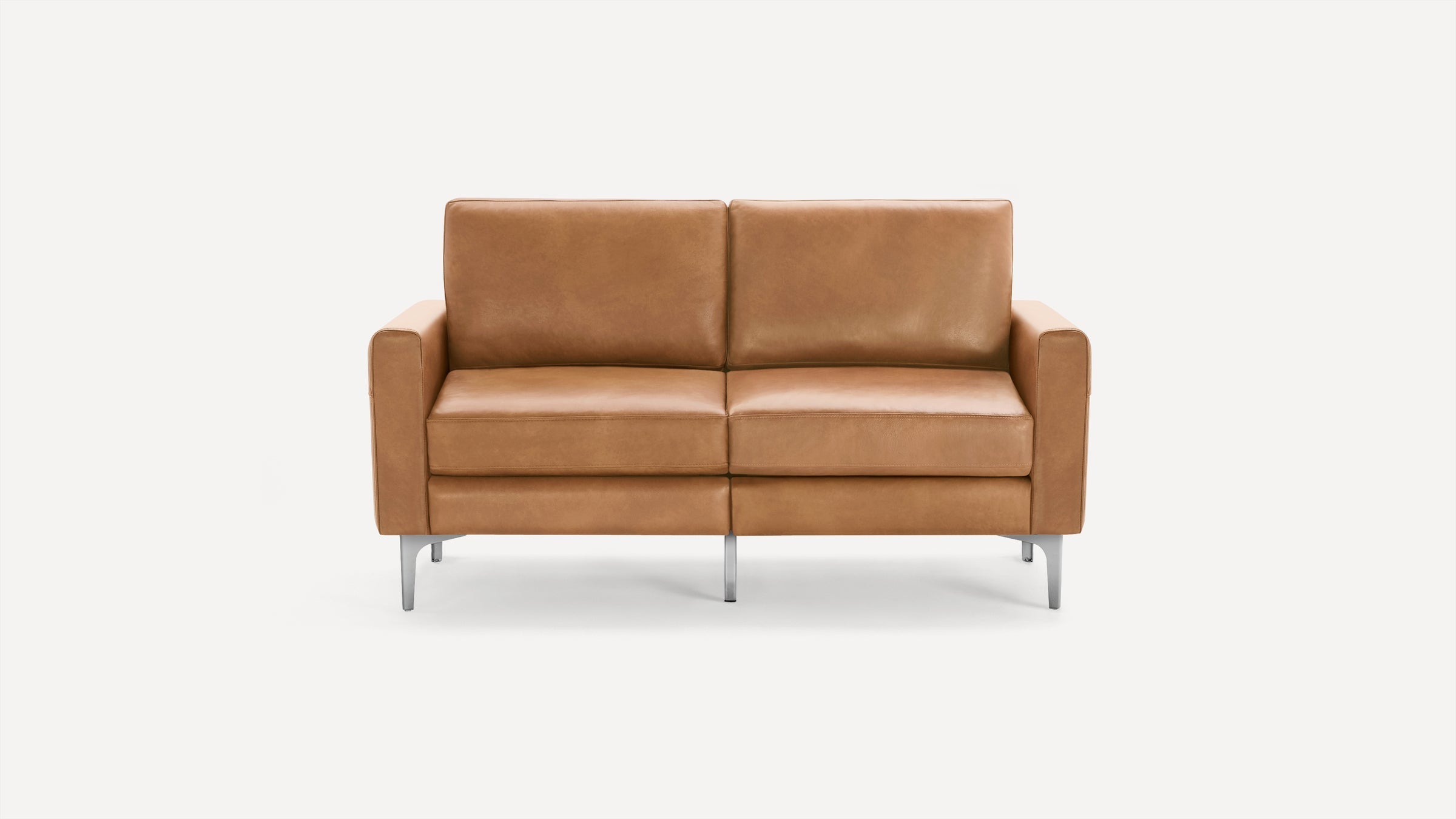 Front view of a modern two-seater tan leather sofa with clean lines and slim metal legs on a white background.