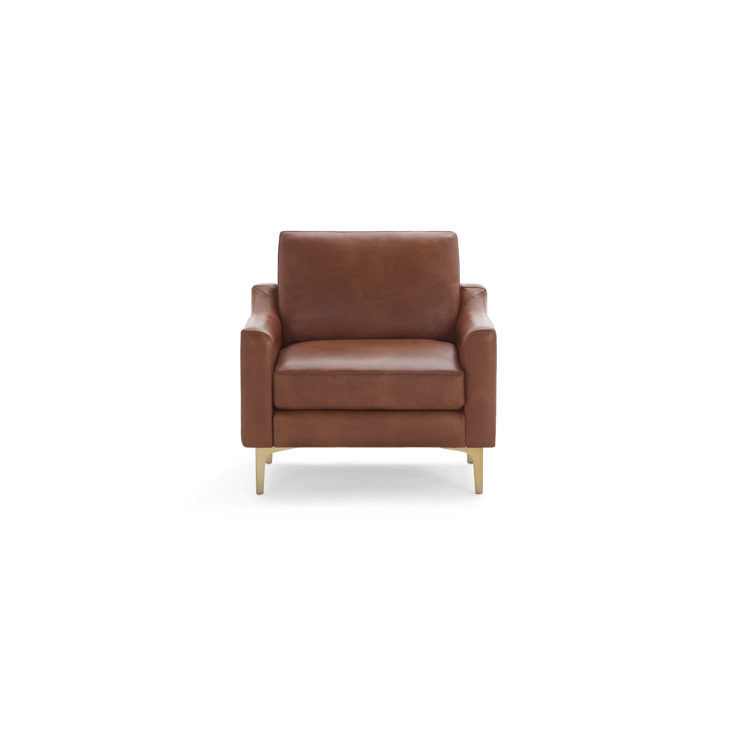 Brown leather armchair with square arms and cushioned back, supported by four short gold metal legs, isolated on black background.