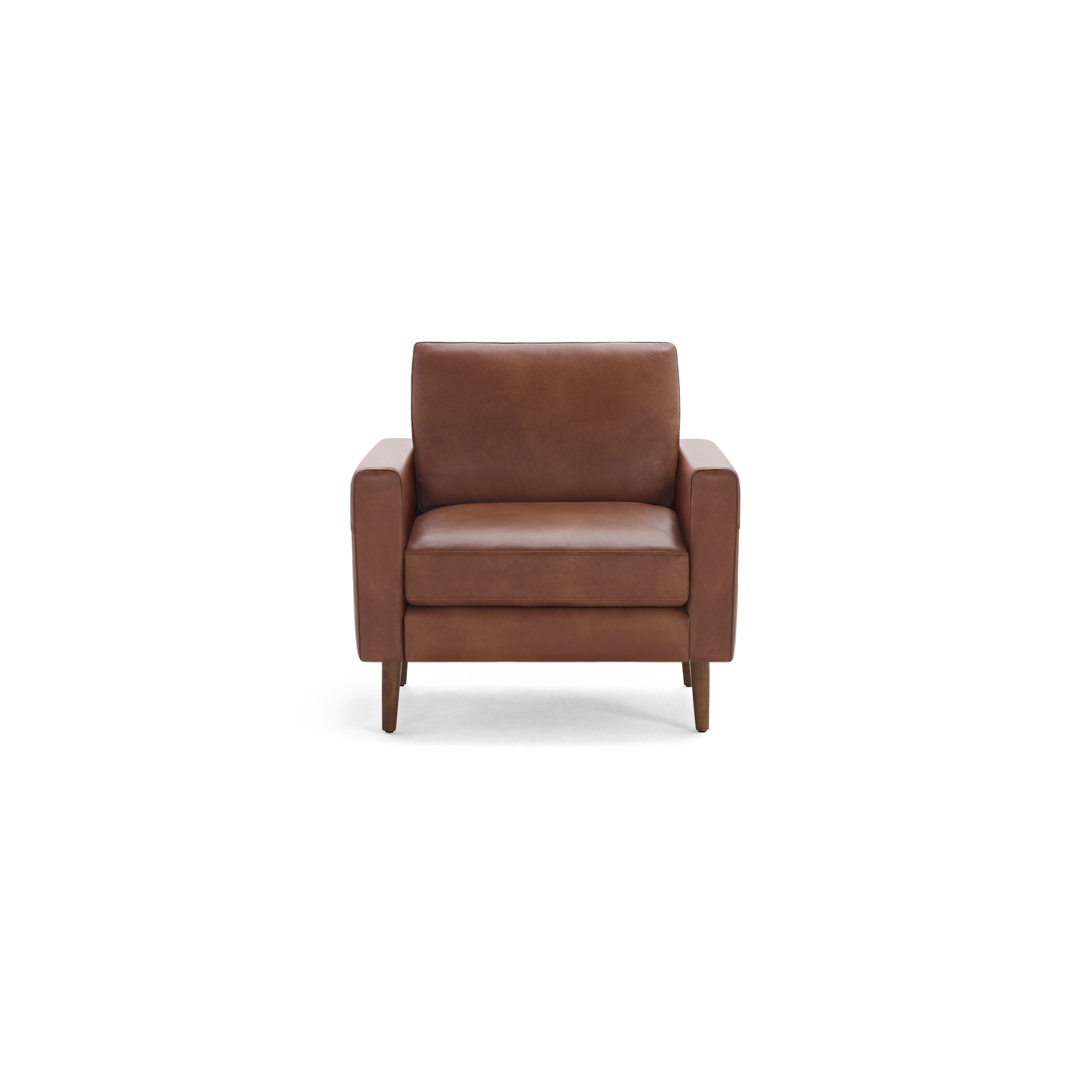 Brown leather armchair with cushioned seat and backrest, boxy armrests, and wooden tapered legs.