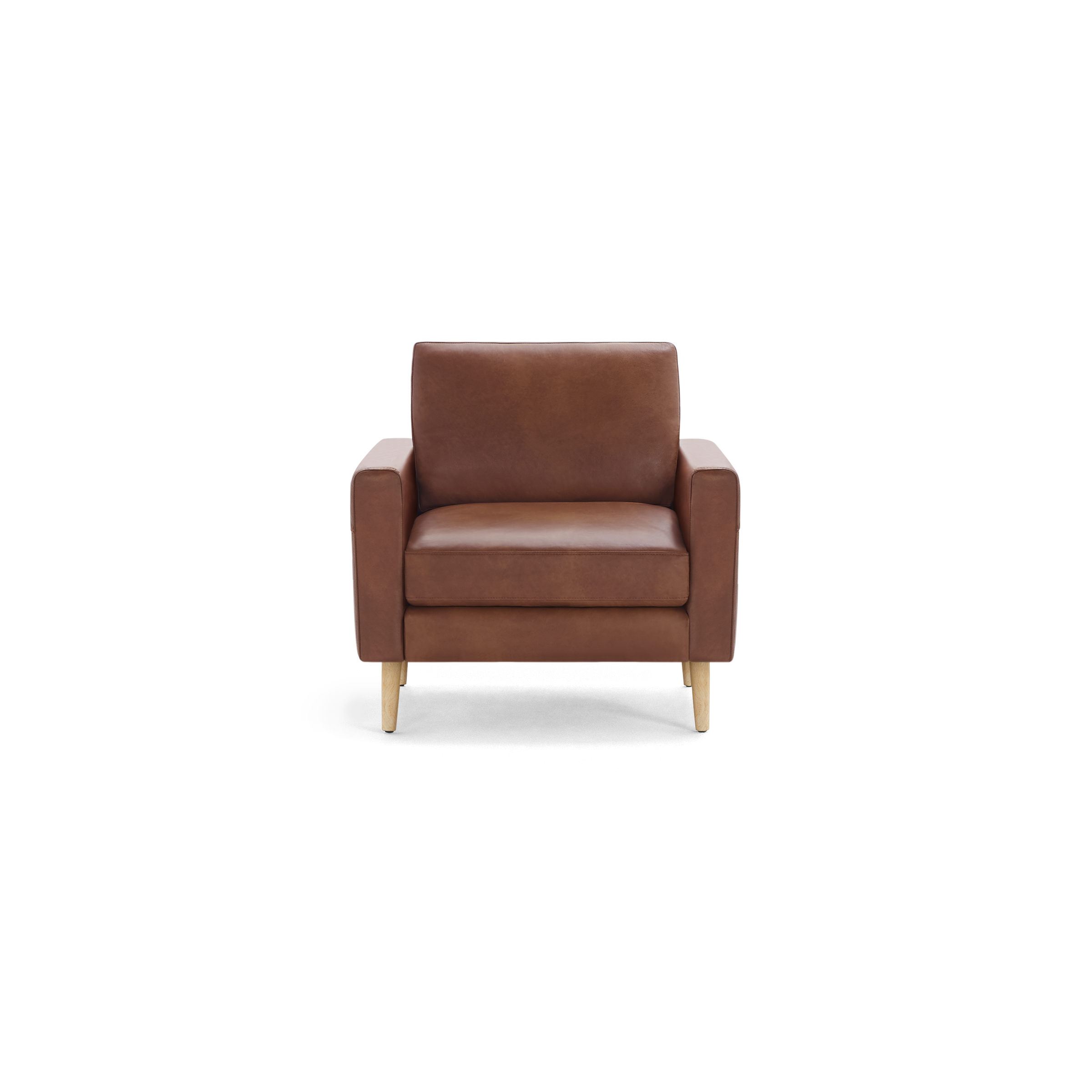 Brown leather armchair with clean lines, thick cushions, and light wooden legs, shown against a black background.