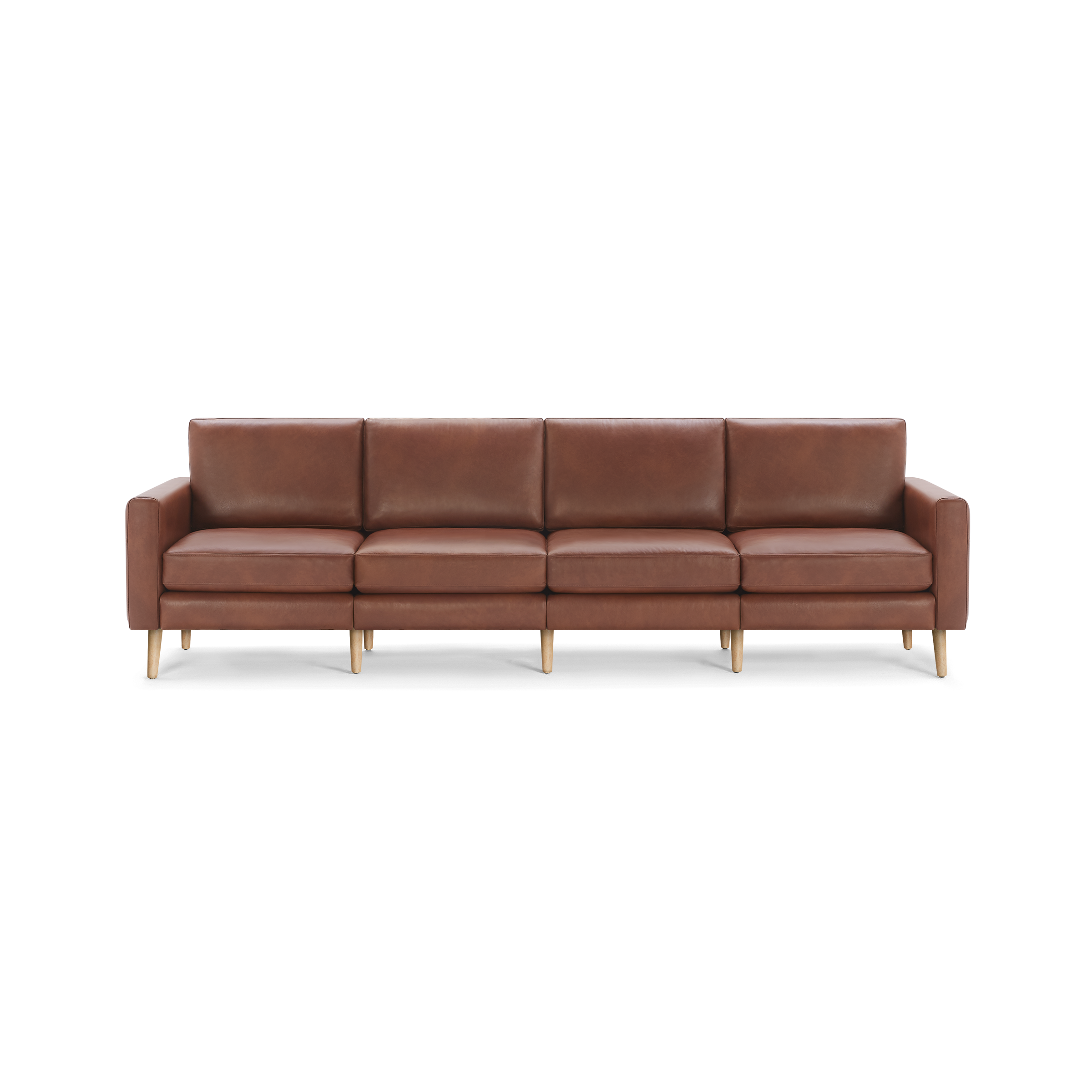Brown leather four-seater sofa with wooden tapered legs, clean lines, and cushioned seats and backrests.