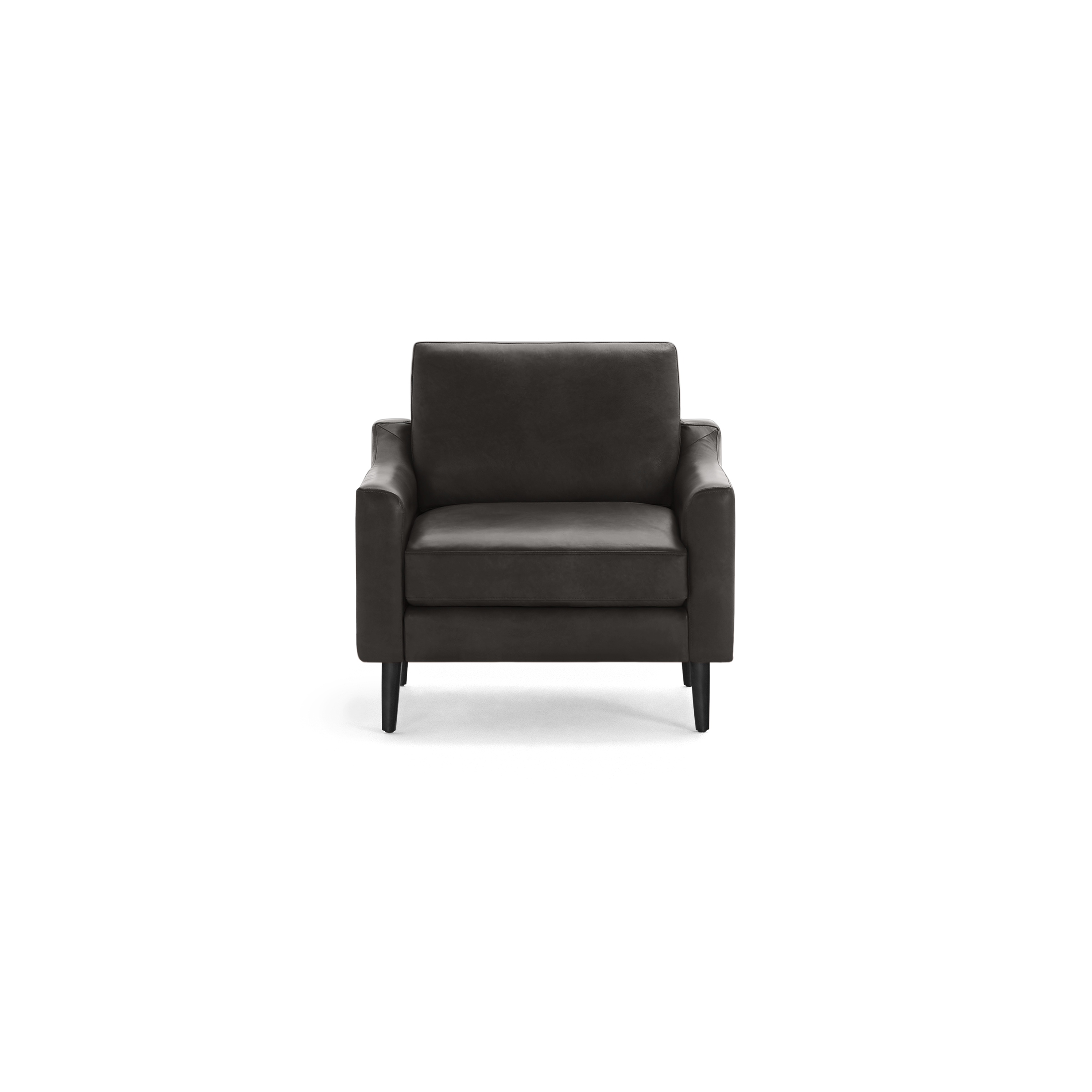 Dark gray modern armchair with wide arms, cushioned seat and backrest, supported by four tapered wooden legs.