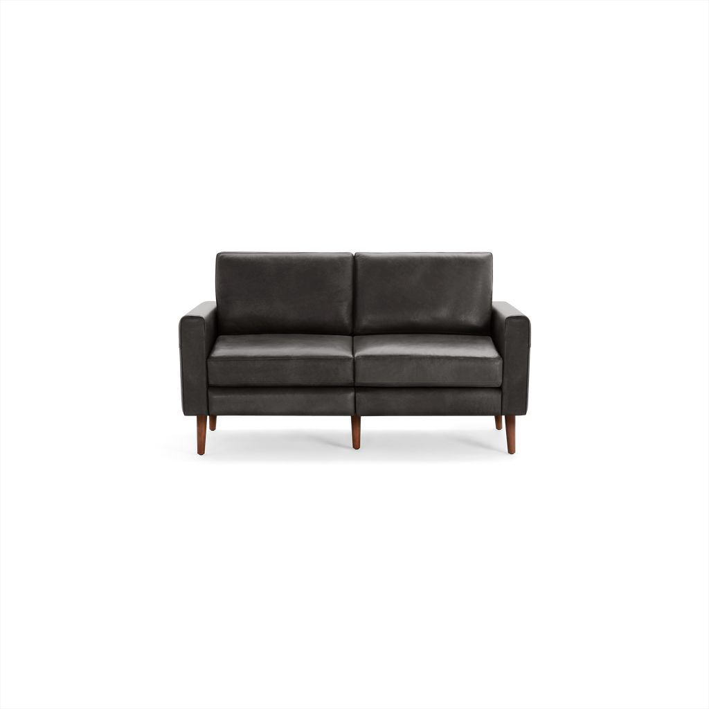 Dark gray leather two-seater sofa with square arms and wooden legs, modern and minimalist design.