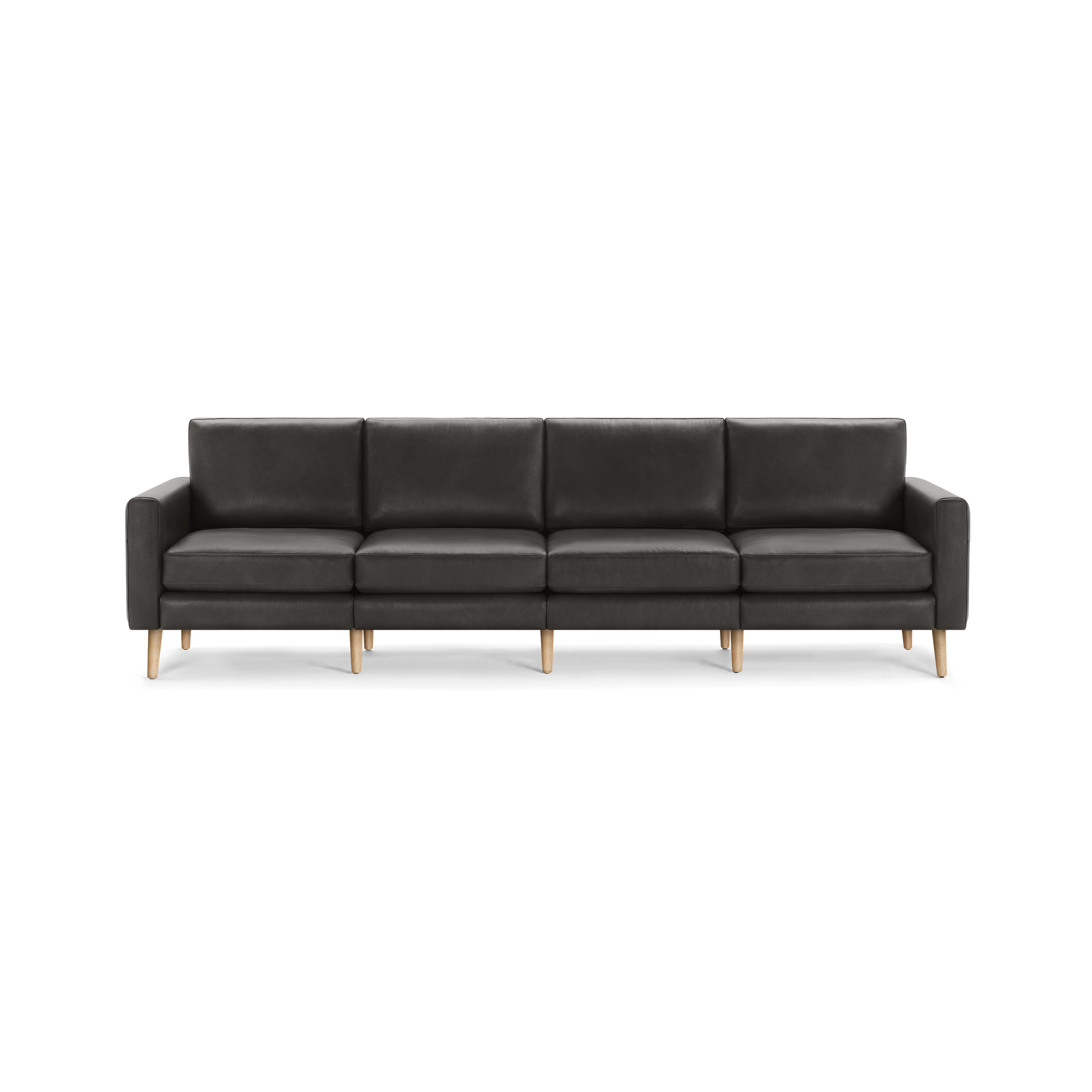 Modern dark gray leather sectional sofa with four seat cushions and light wooden legs, suitable for spacious living rooms.