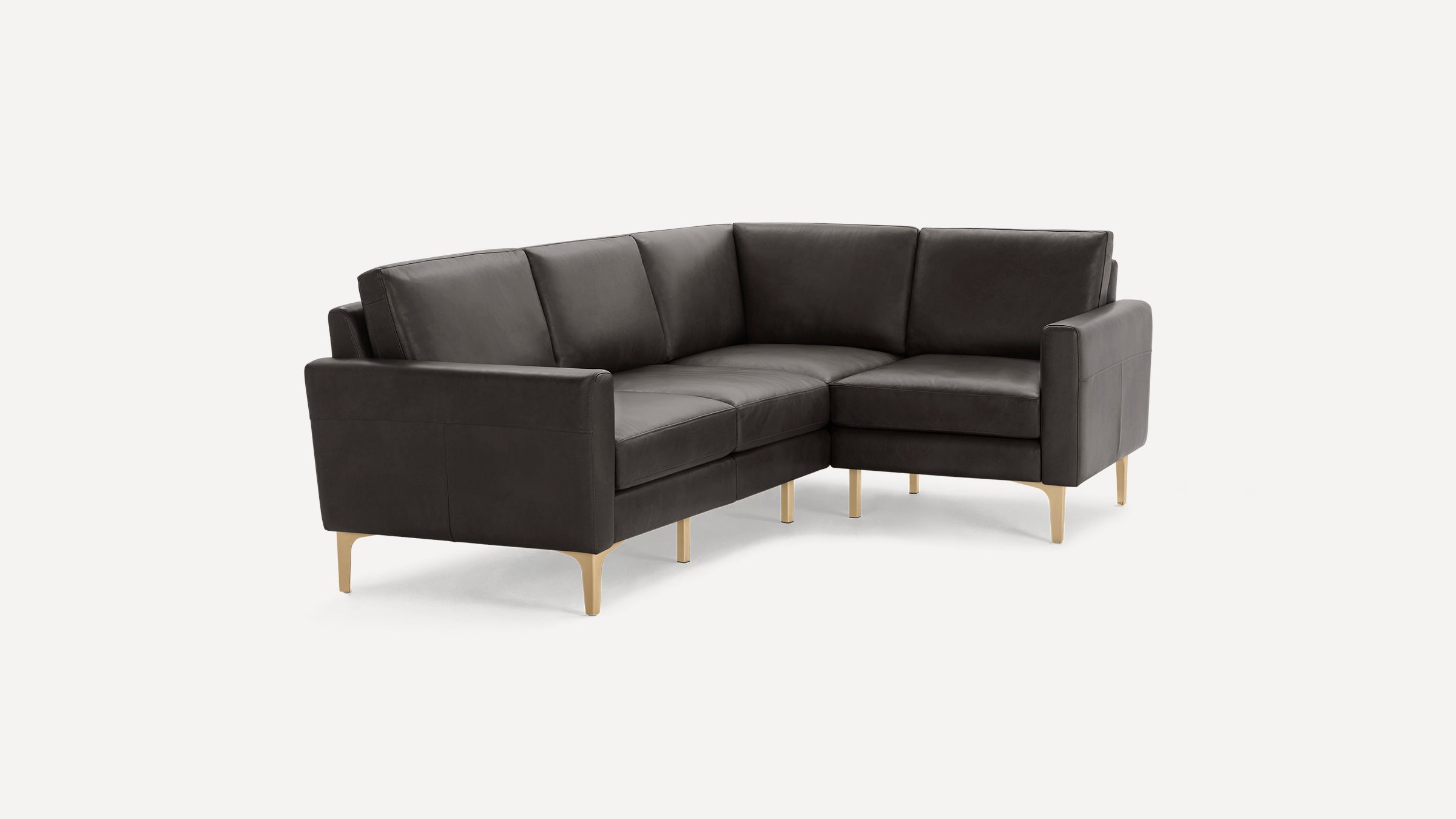 Modern L-shaped dark gray leather sectional sofa with clean lines and light wooden tapered legs, on a white background.