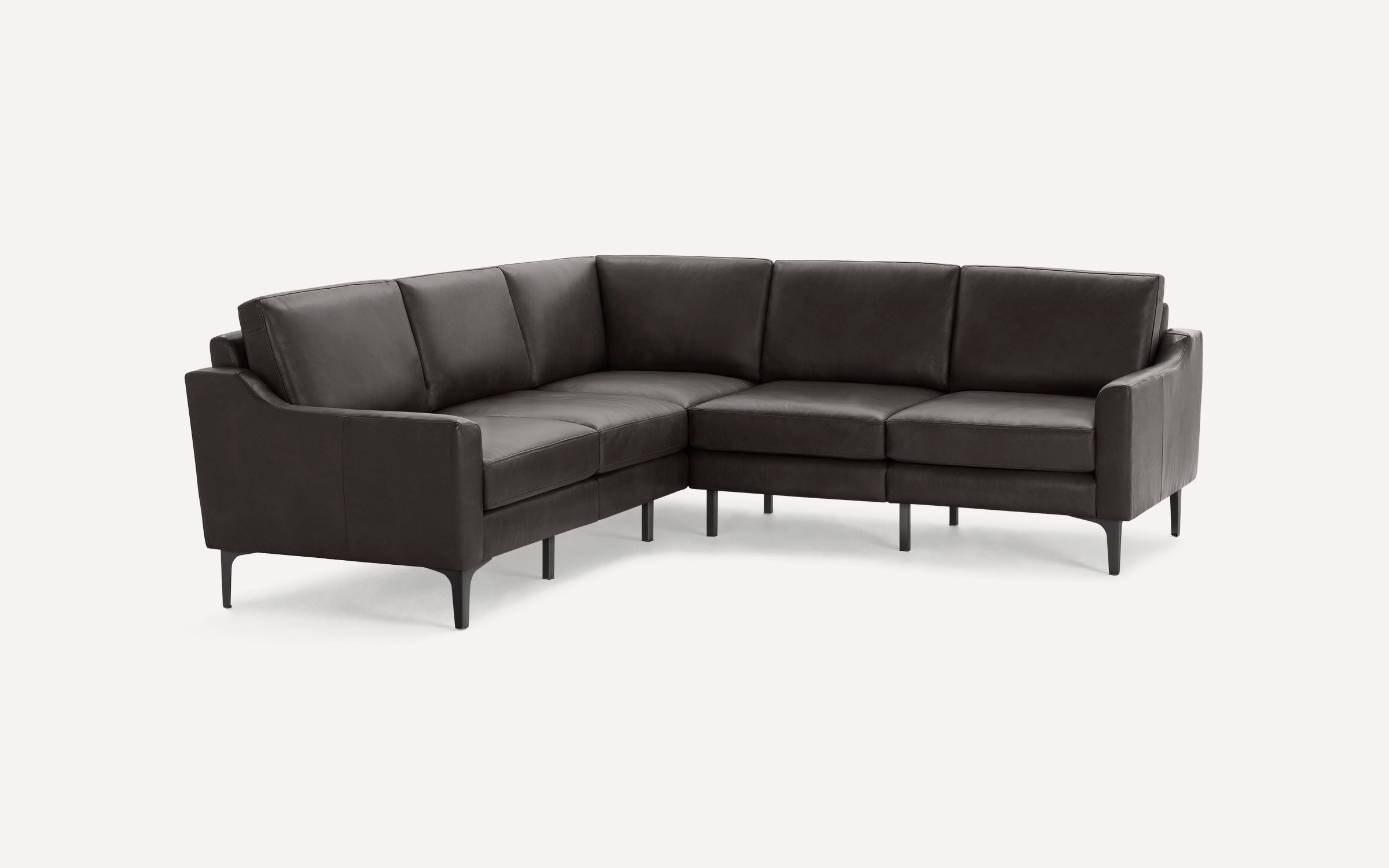 Modern dark brown leather L-shaped sectional sofa with slim black legs, clean lines, and cushioned seats and backrests.