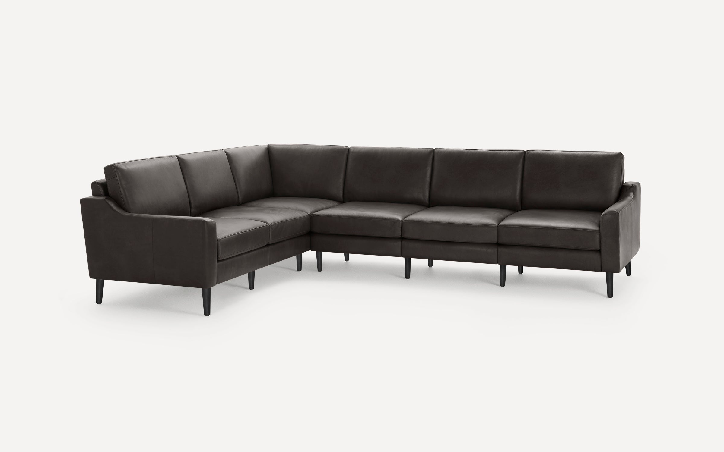 Dark brown leather L-shaped sectional sofa with clean lines and slim black legs, designed for modern living spaces.