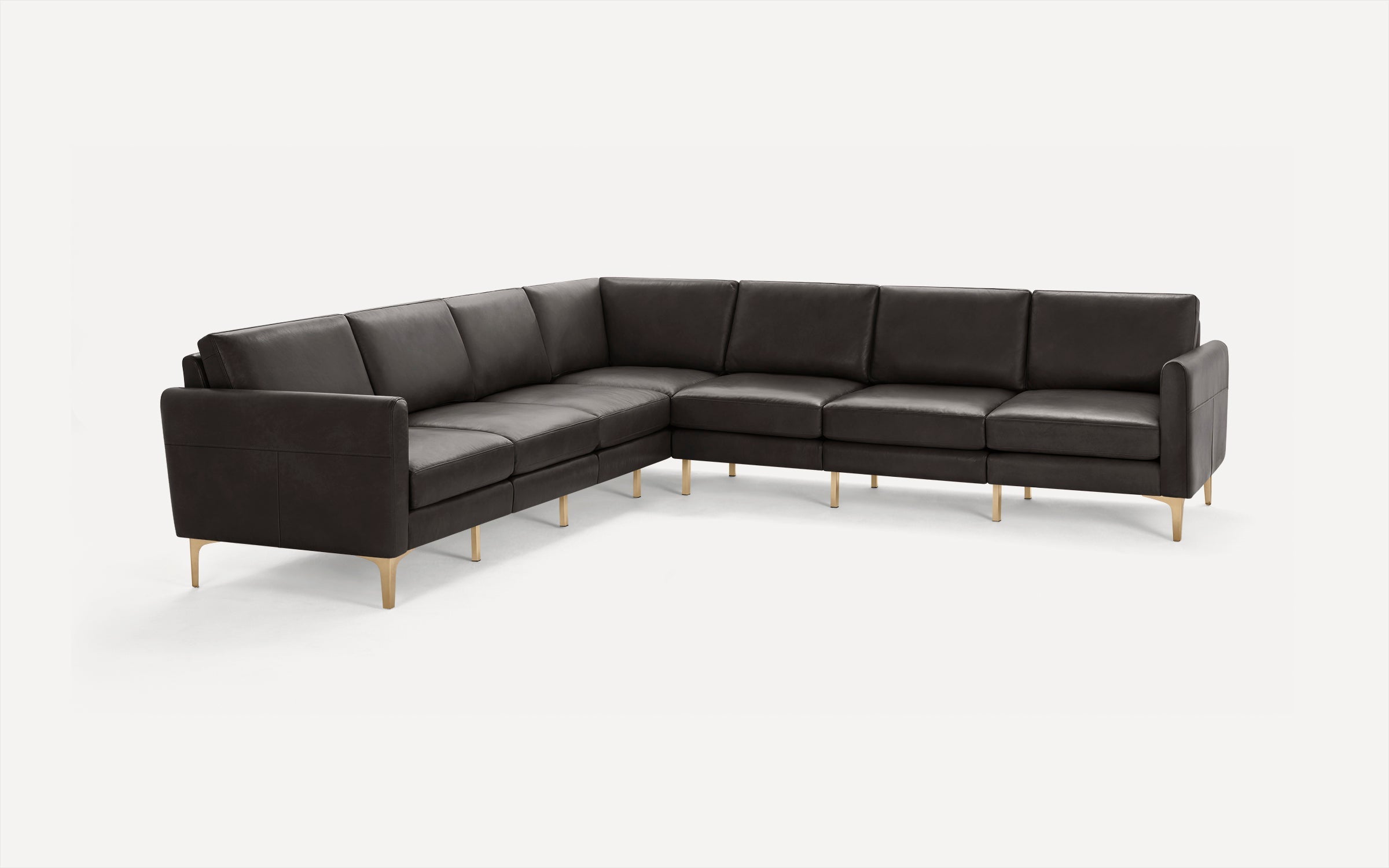 Modern black leather sectional sofa with clean lines, cushioned seats, and gold-toned legs on a white background.