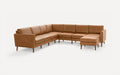 Large brown leather sectional sofa with wooden legs, featuring an L-shape design and cushioned seats and backs.