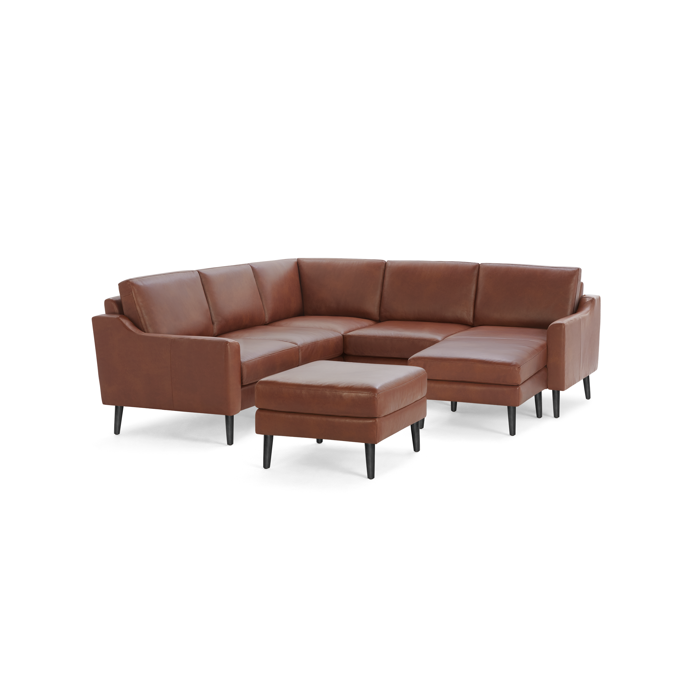 Brown leather sectional sofa with an ottoman, featuring clean lines and black tapered legs for modern living spaces.
