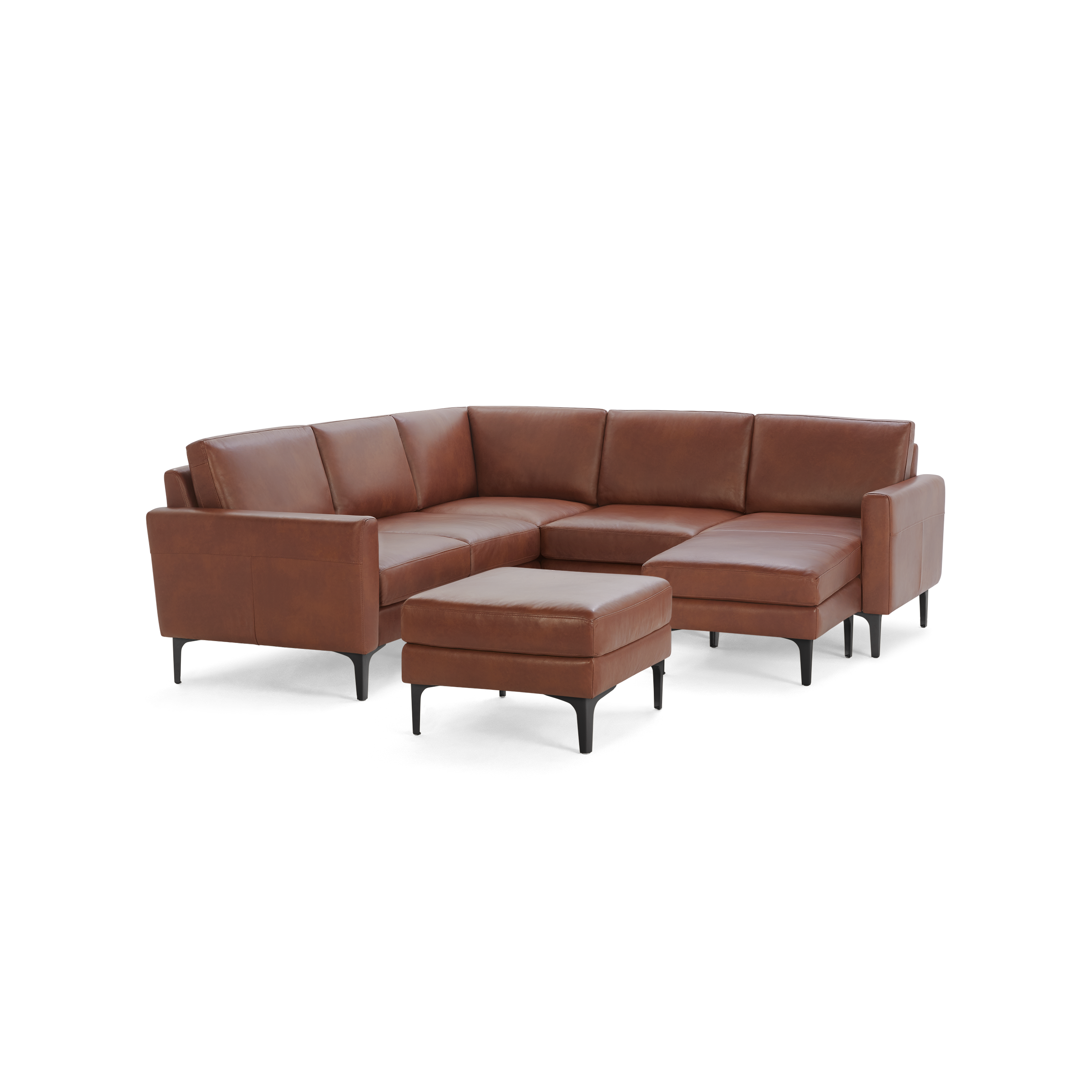 Modern brown leather sectional sofa with matching ottoman, sleek black legs, and clean, minimalist design.