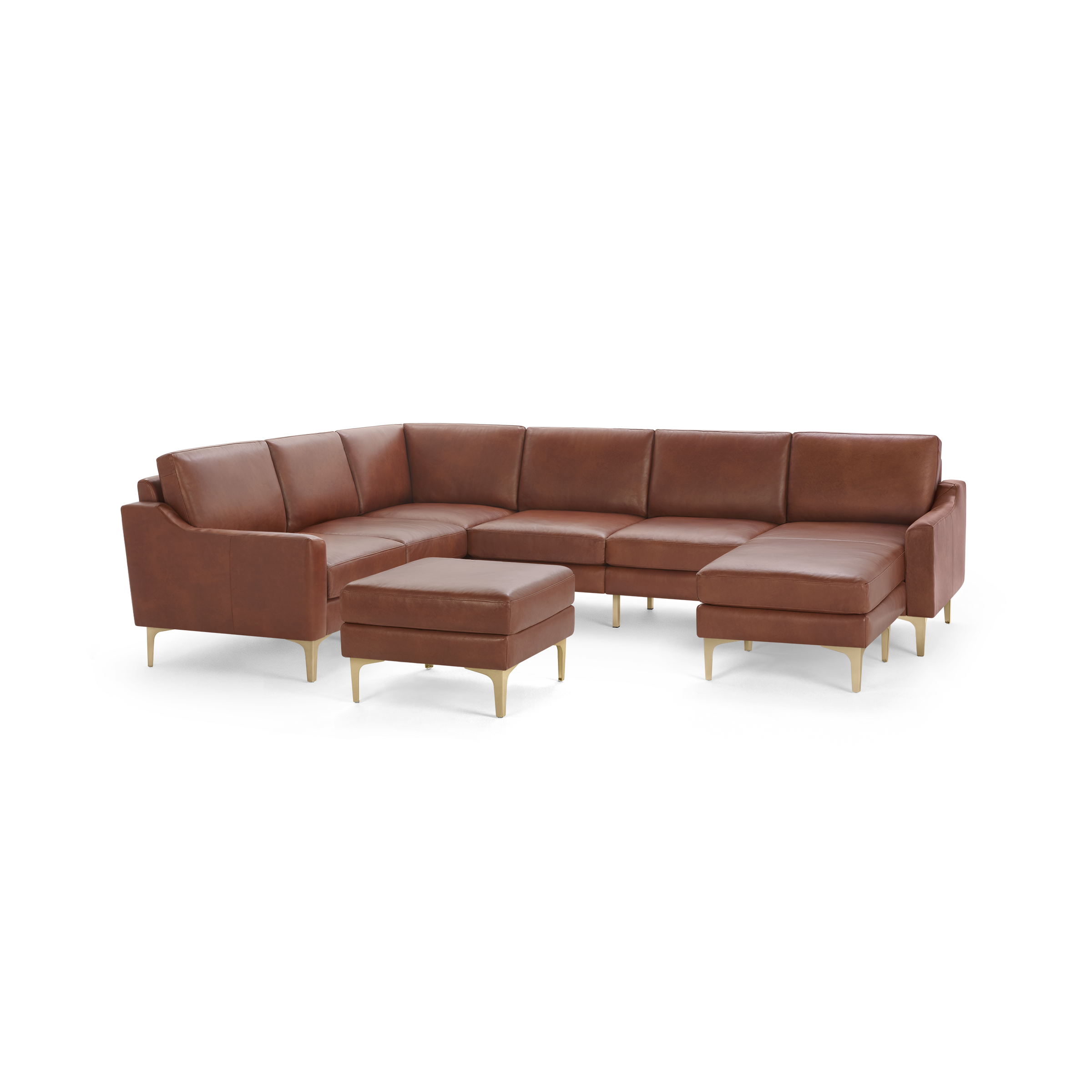 Brown leather sectional sofa with chaise lounge and matching ottoman, featuring gold-toned legs and clean, modern design.