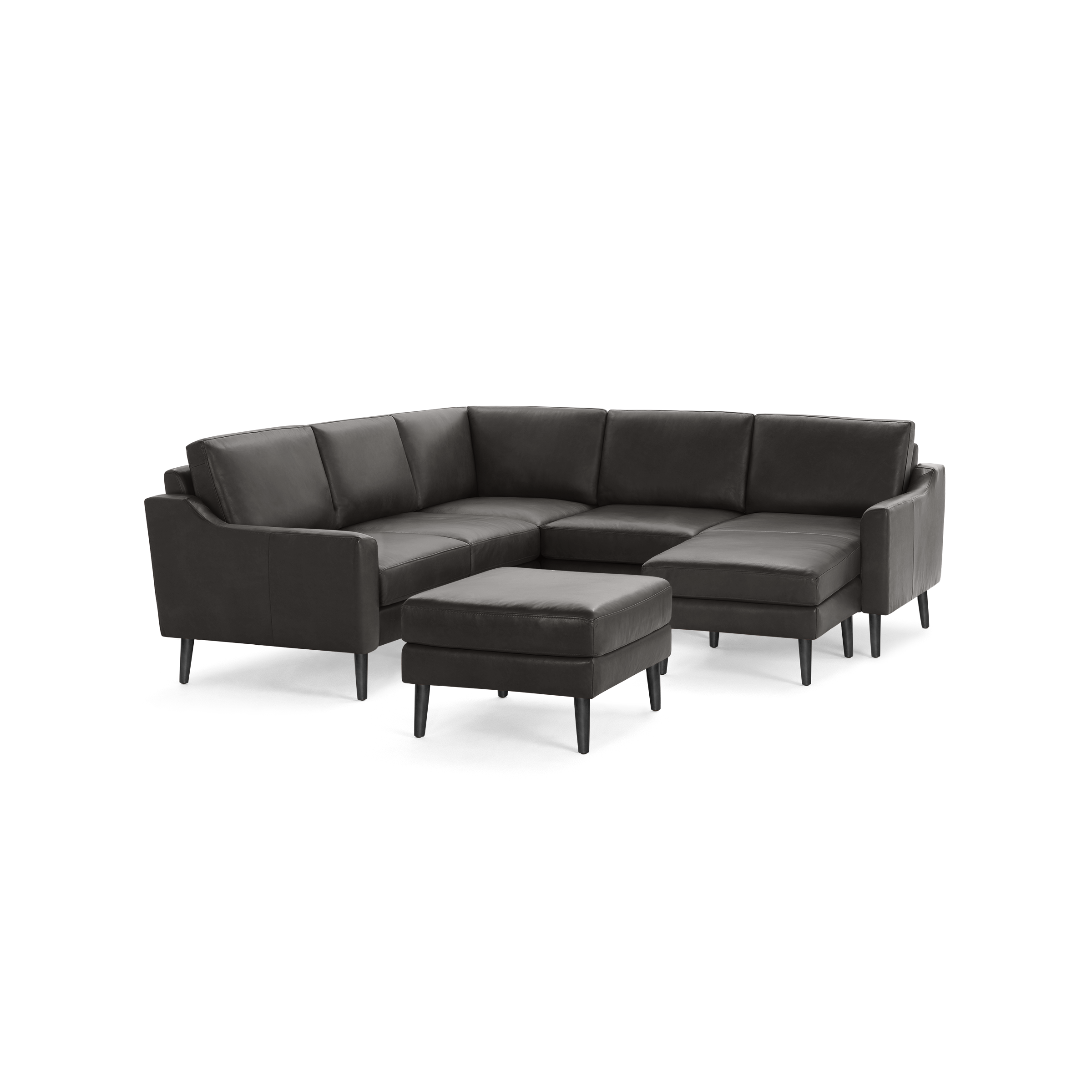 Dark gray modern sectional sofa with clean lines, plush cushions, armrests, and matching ottoman on black tapered legs.