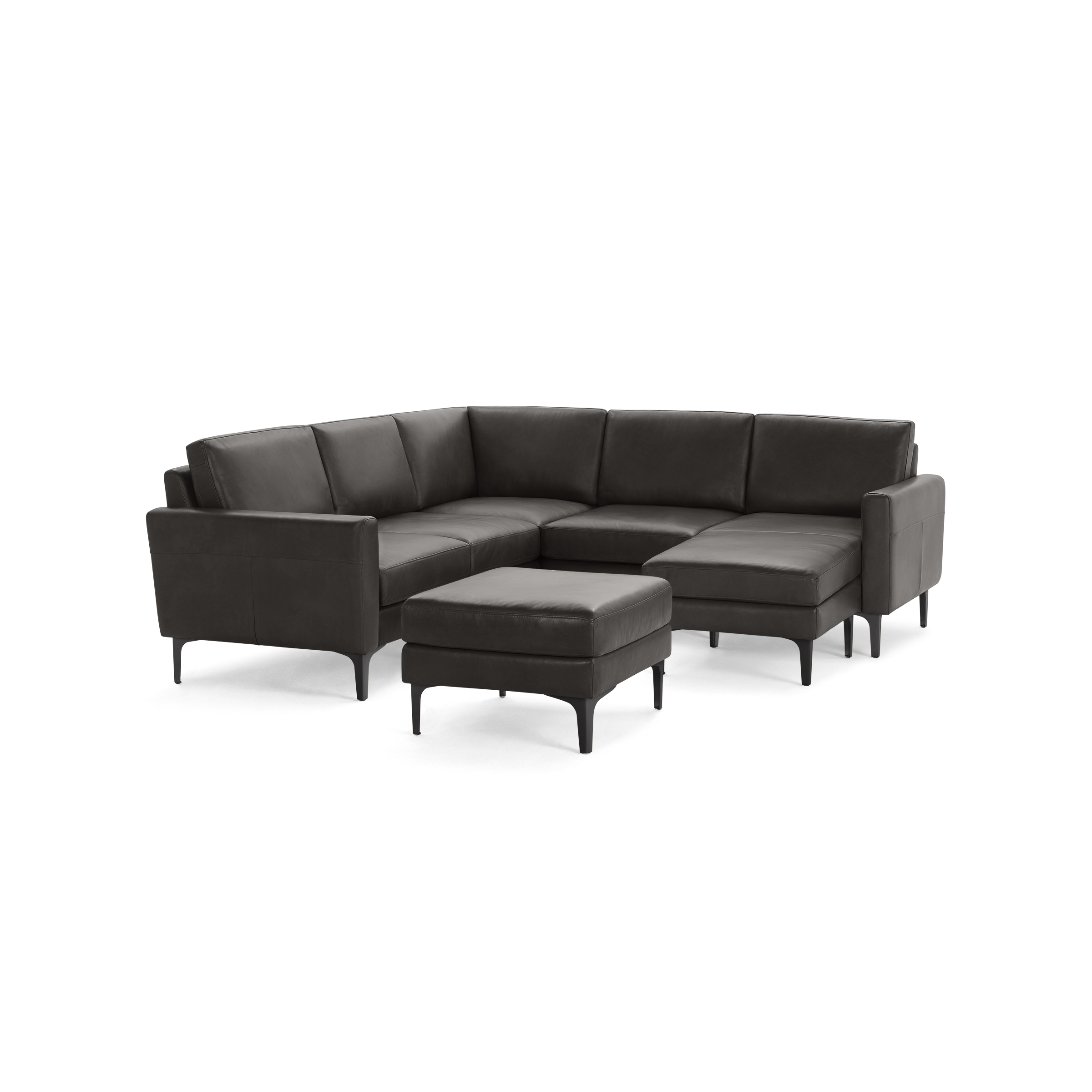 L-shaped modern sectional sofa in dark gray leather with clean lines, plush cushions, and matching ottoman on black legs.