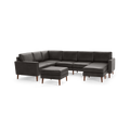 Dark gray leather sectional sofa with wooden legs and matching ottoman, featuring clean lines and modern design.