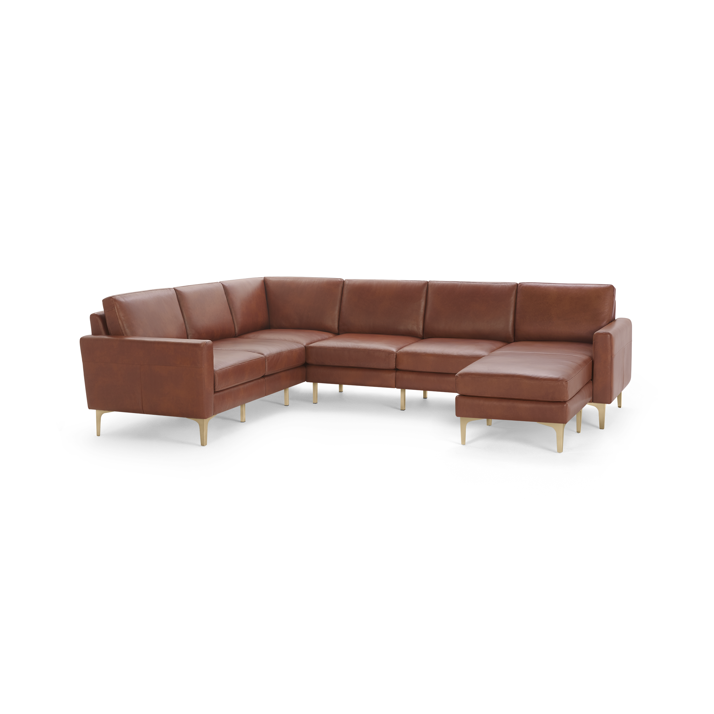 Large L-shaped sectional sofa in brown leather with clean lines, plush cushions, and slim gold metal legs.