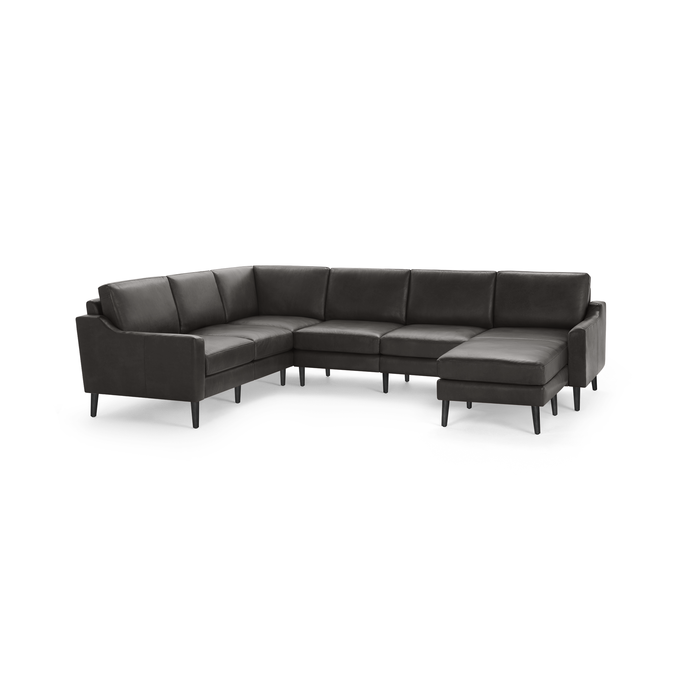 Large modern L-shaped sectional sofa in dark gray fabric with clean lines and tapered black legs.
