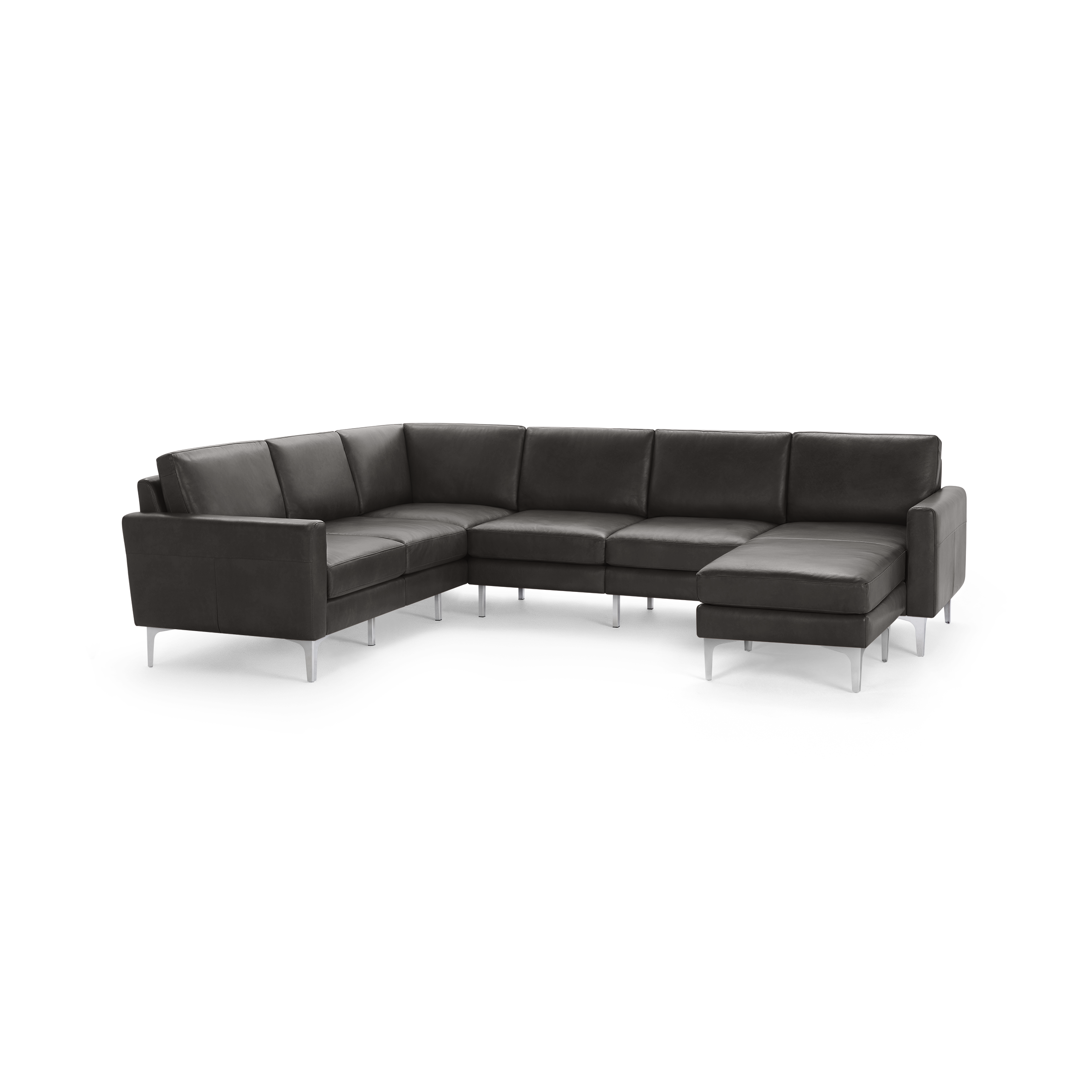Modern dark gray leather sectional sofa with metal legs and right-side chaise lounge, designed for spacious living rooms.