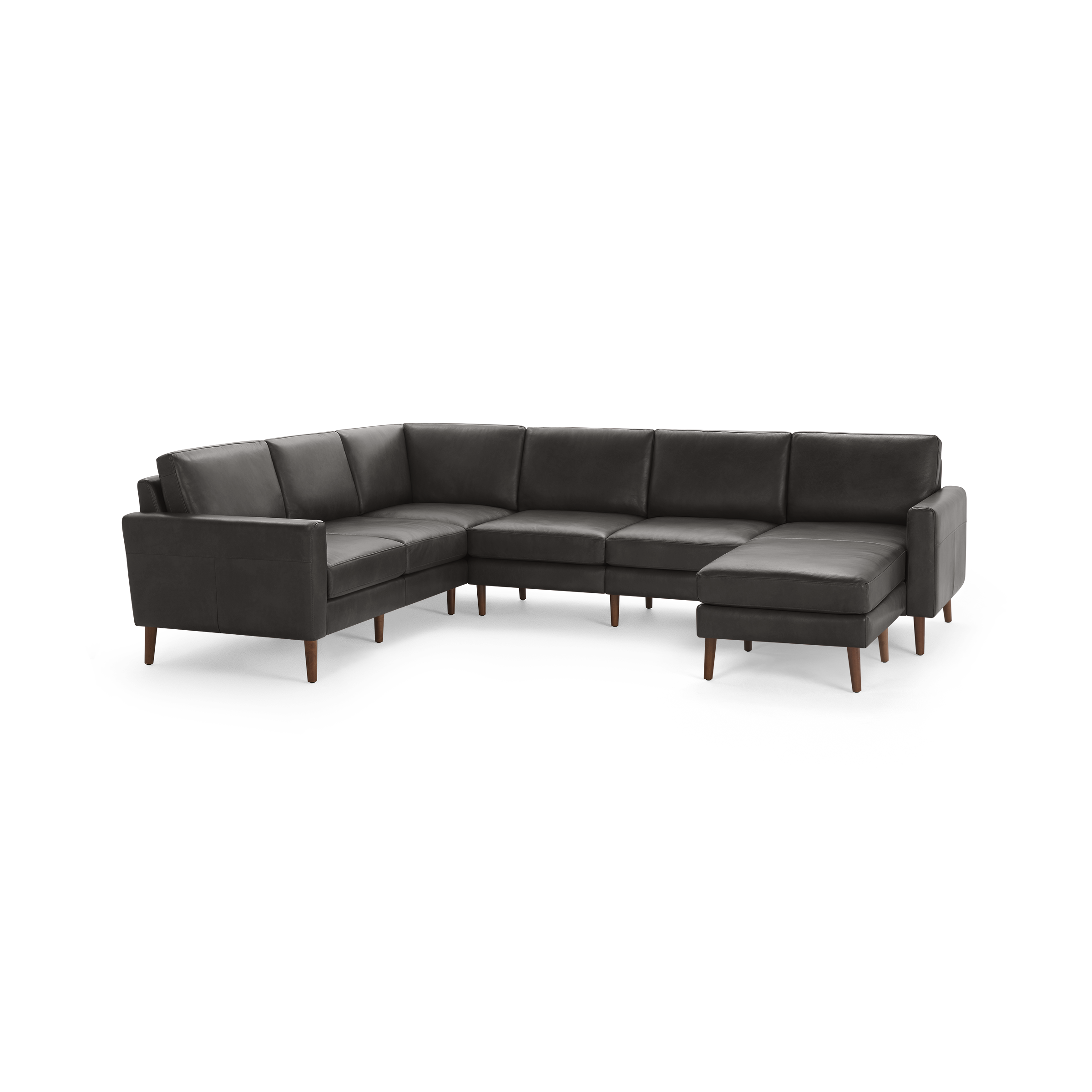 Modern dark gray leather sectional sofa with wooden legs, featuring an L-shaped design and cushioned backrests for comfort.