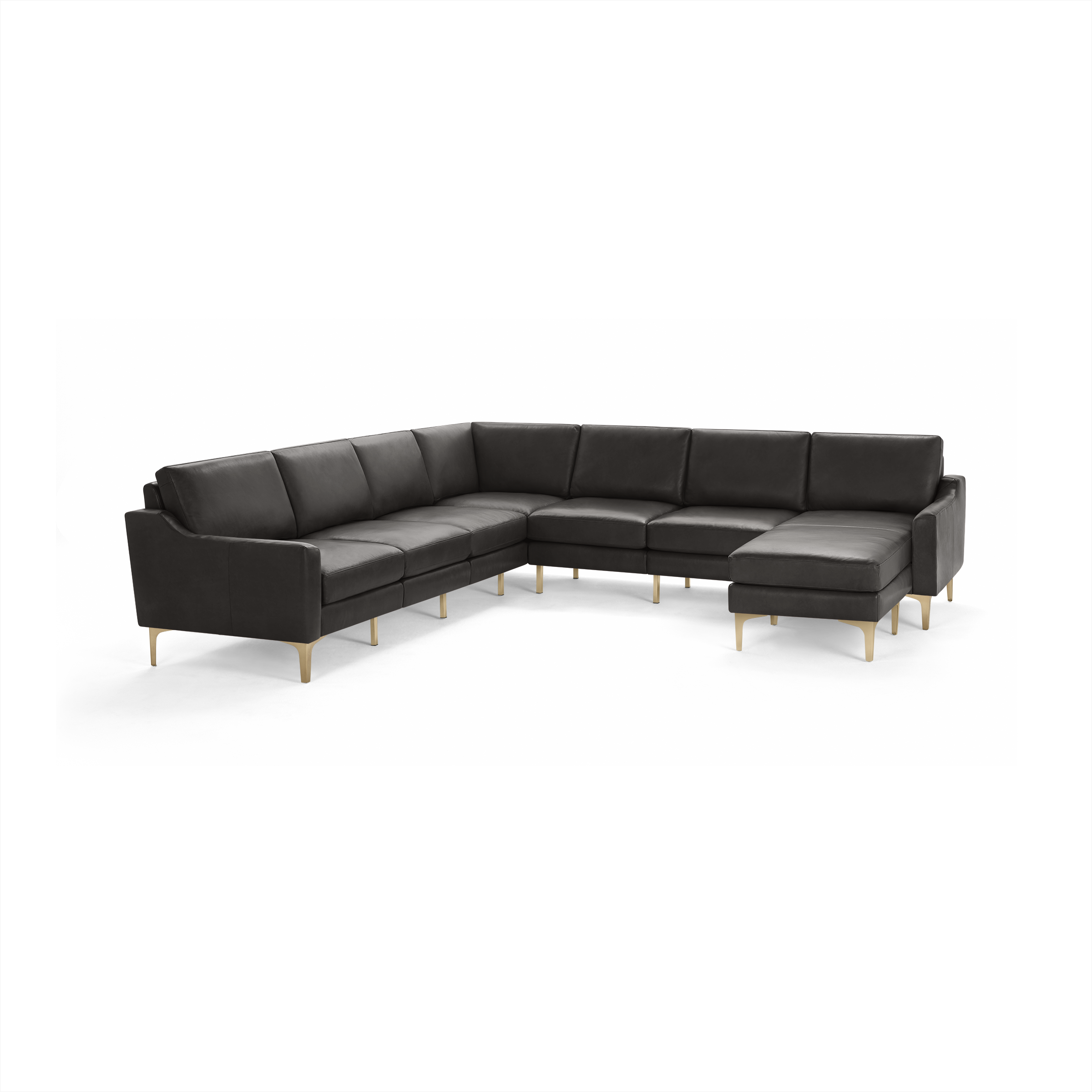 Large modern dark gray leather sectional sofa with gold metal legs, L-shaped design, and cushioned seats and backs.