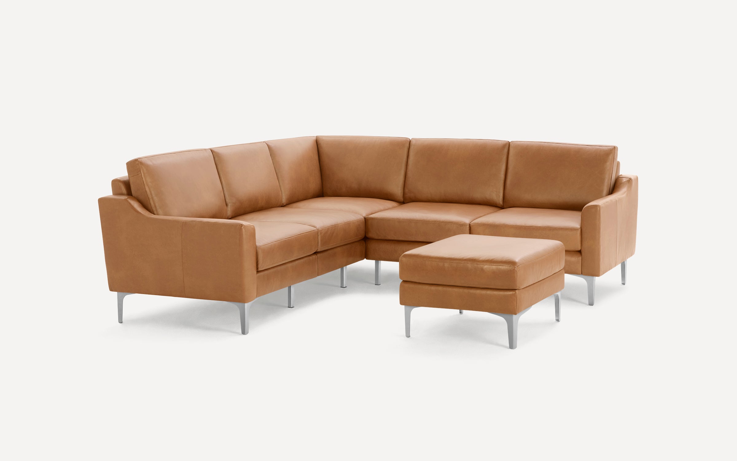 Modern brown leather L-shaped sectional sofa with matching ottoman, featuring sleek silver metal legs and minimalist design.
