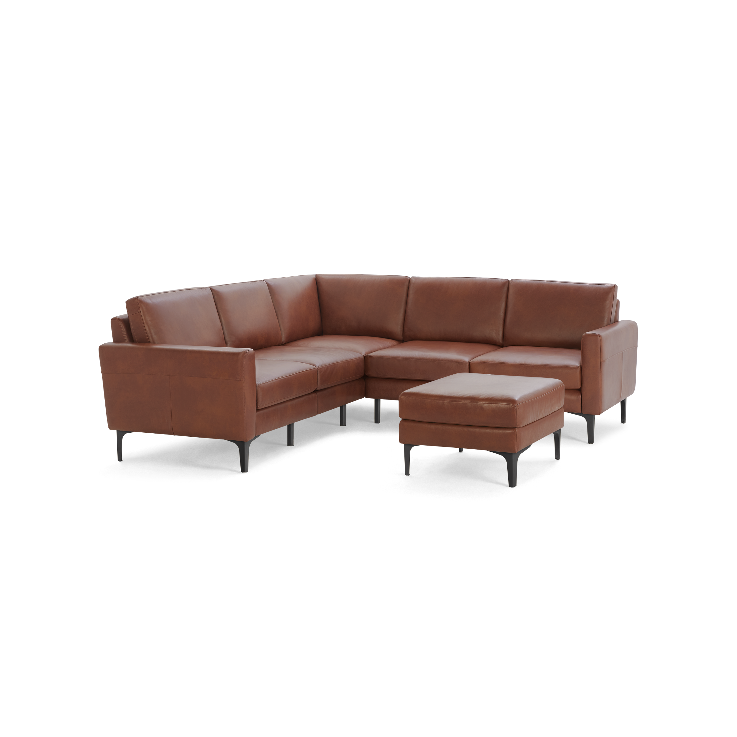 Modern L-shaped sectional sofa in rich brown leather with black legs, accompanied by a matching leather ottoman.