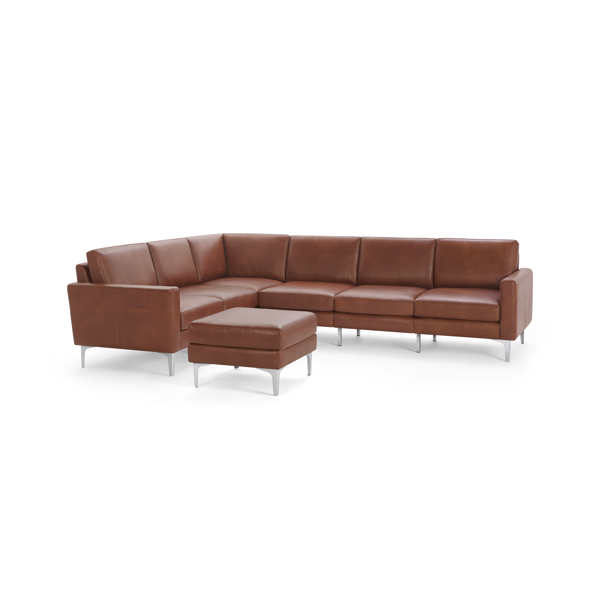 Modern sectional sofa in brown leather with metal legs and a matching ottoman, designed for spacious comfort.