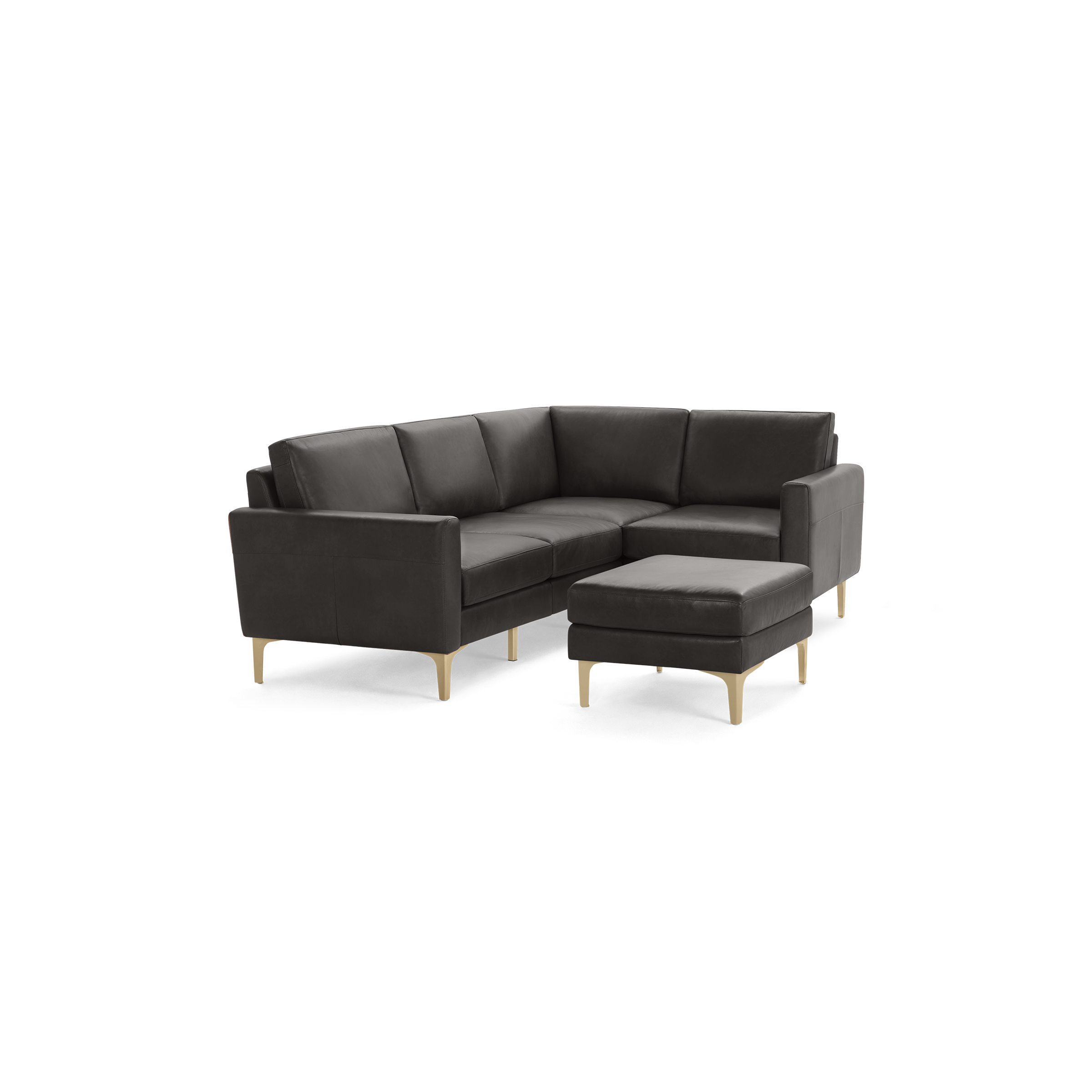 Dark gray leather L-shaped sectional sofa with gold metal legs and matching ottoman.