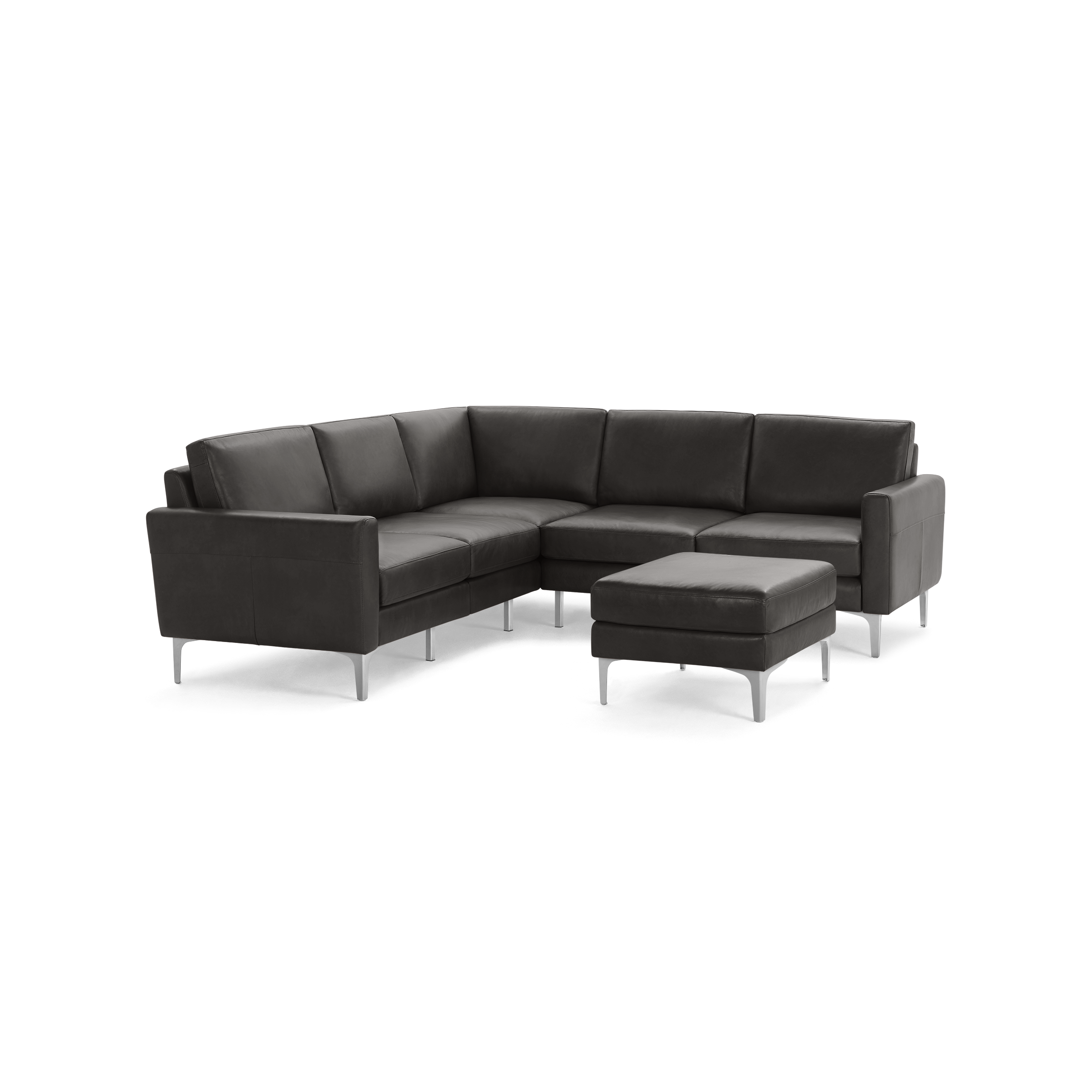 Dark gray L-shaped sectional sofa with metal legs and a matching ottoman, featuring clean lines and modern design.