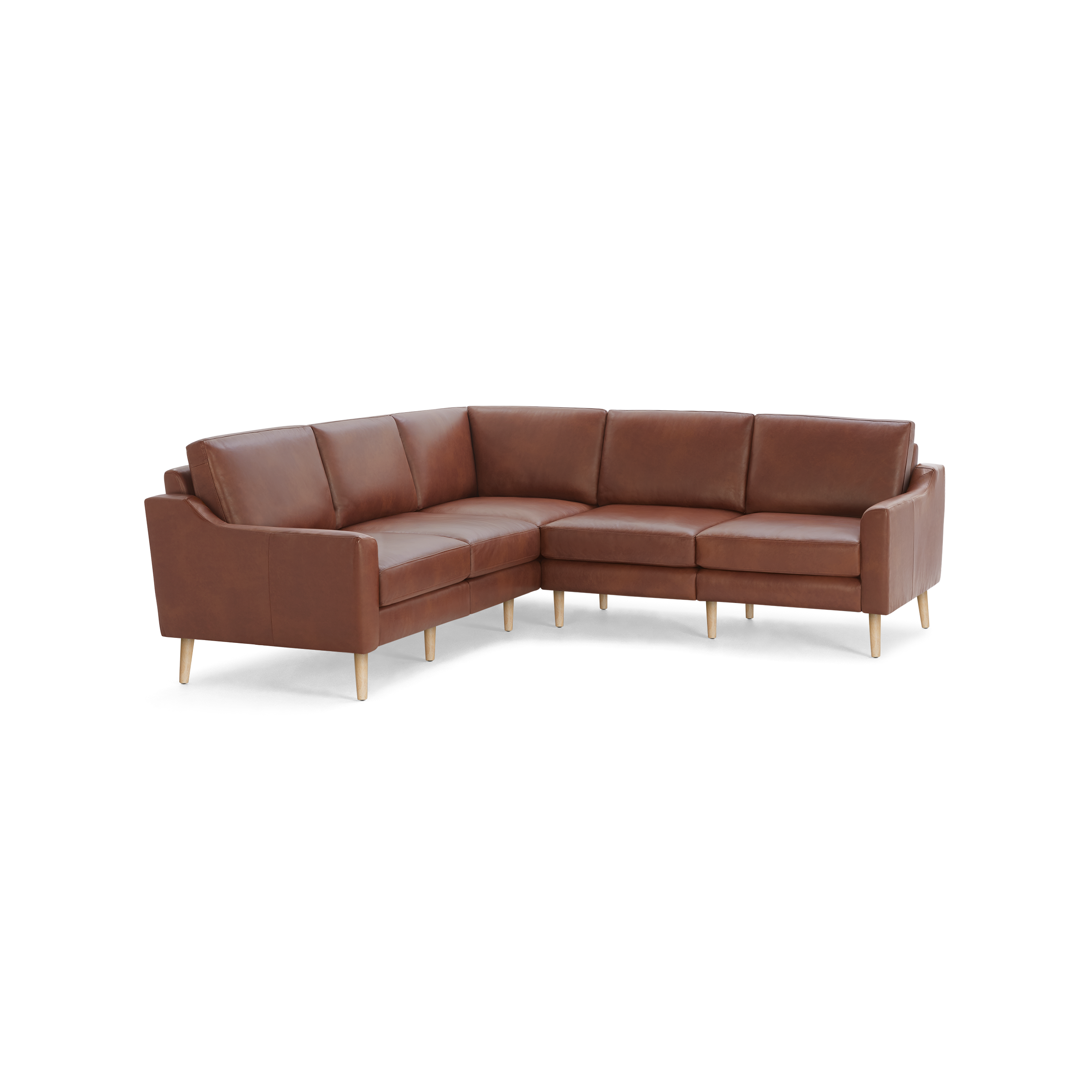 Brown leather L-shaped sectional sofa with wooden legs and cushioned back and seat panels.