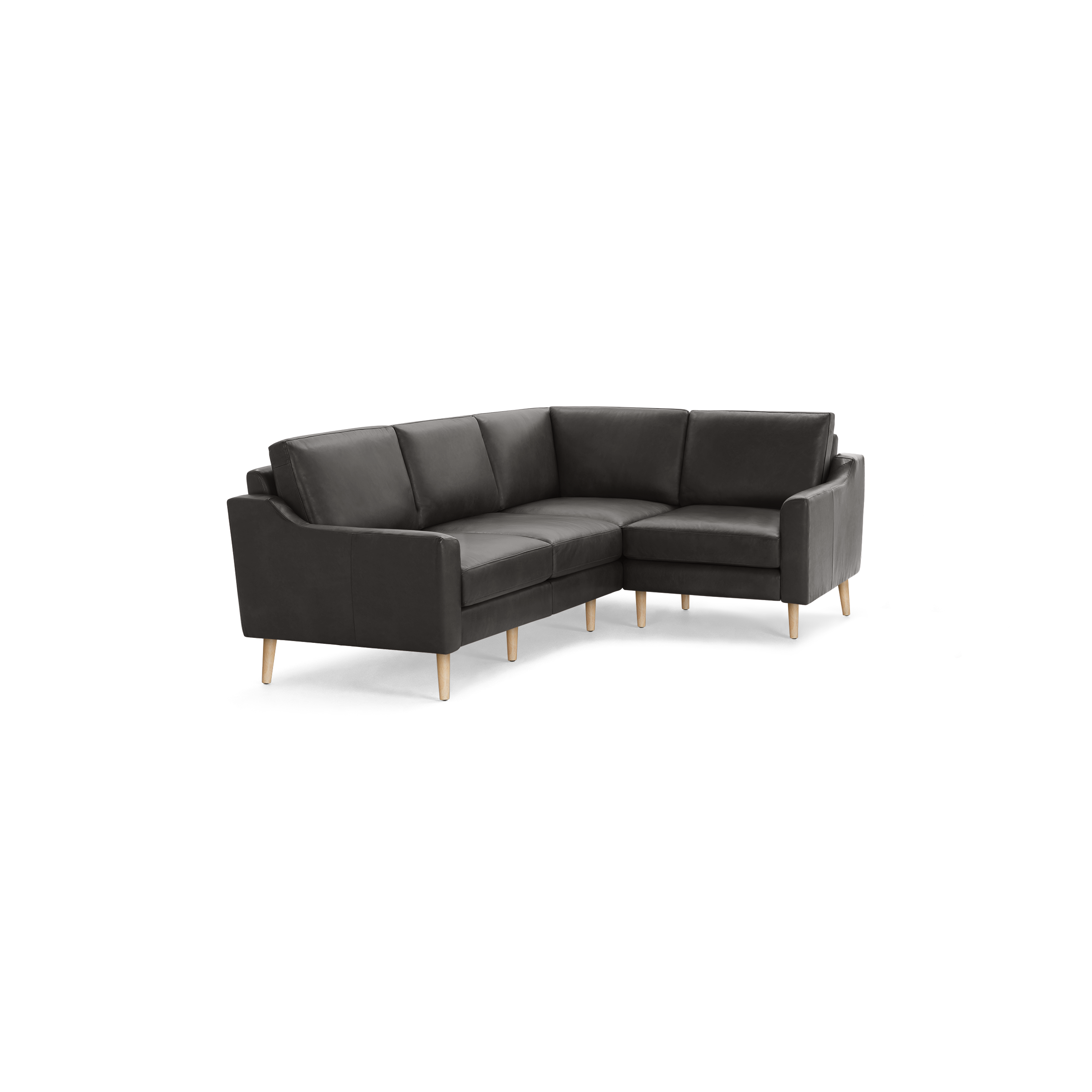 Dark gray L-shaped sectional sofa with smooth upholstery and light wood tapered legs on black background.