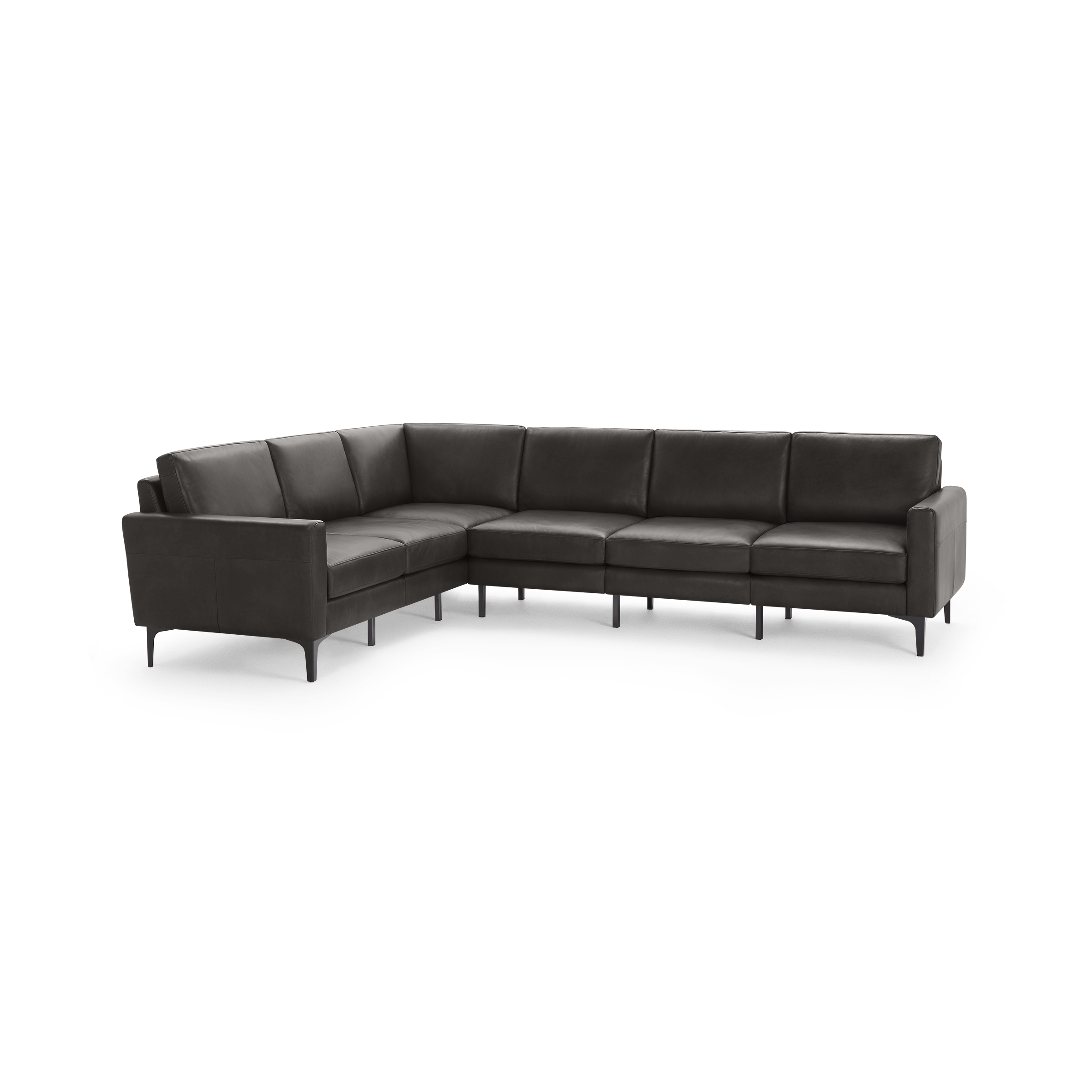 Large modern L-shaped sectional sofa with dark grey leather upholstery and slim black metal legs.