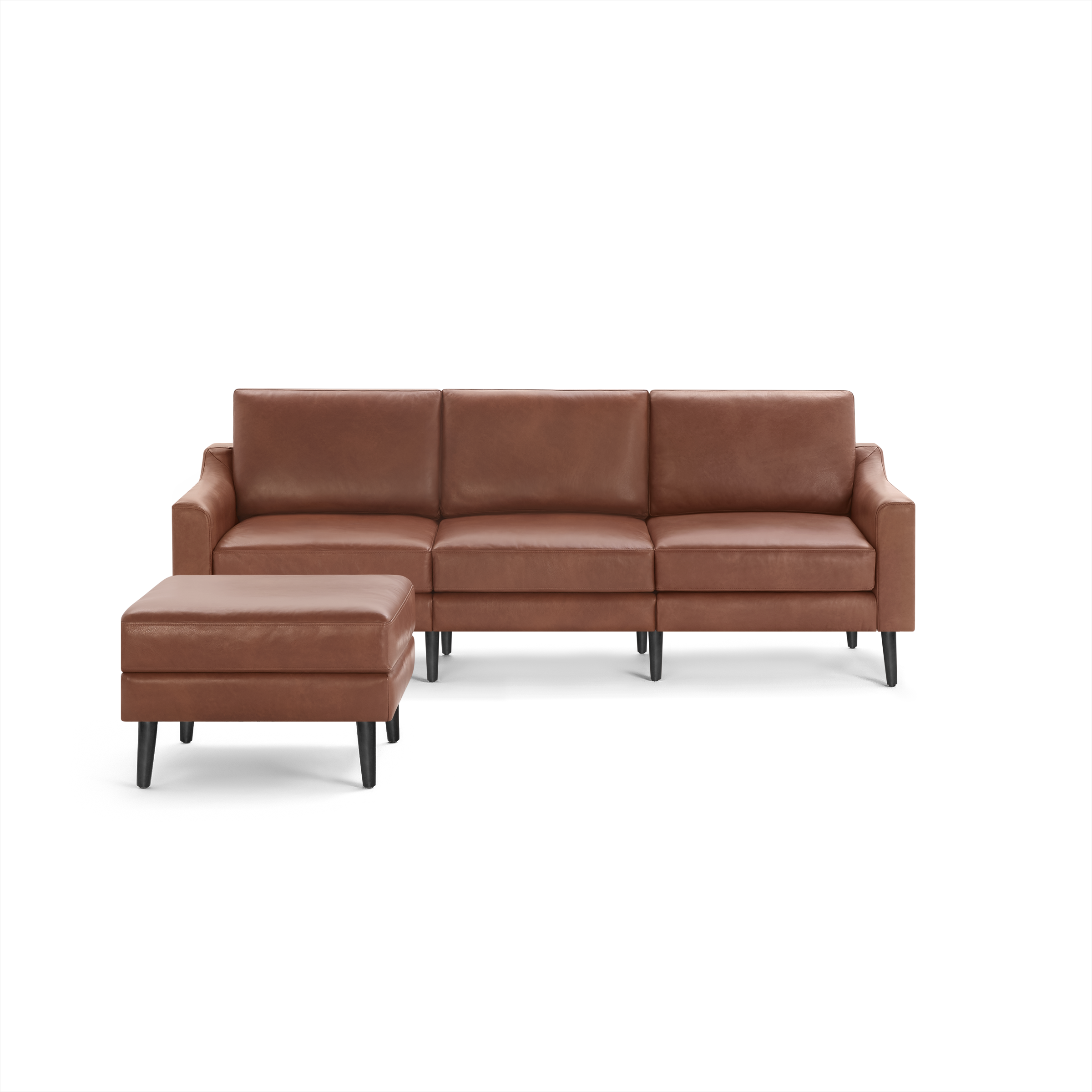 Brown leather sectional sofa with matching ottoman, featuring clean lines and black tapered legs.