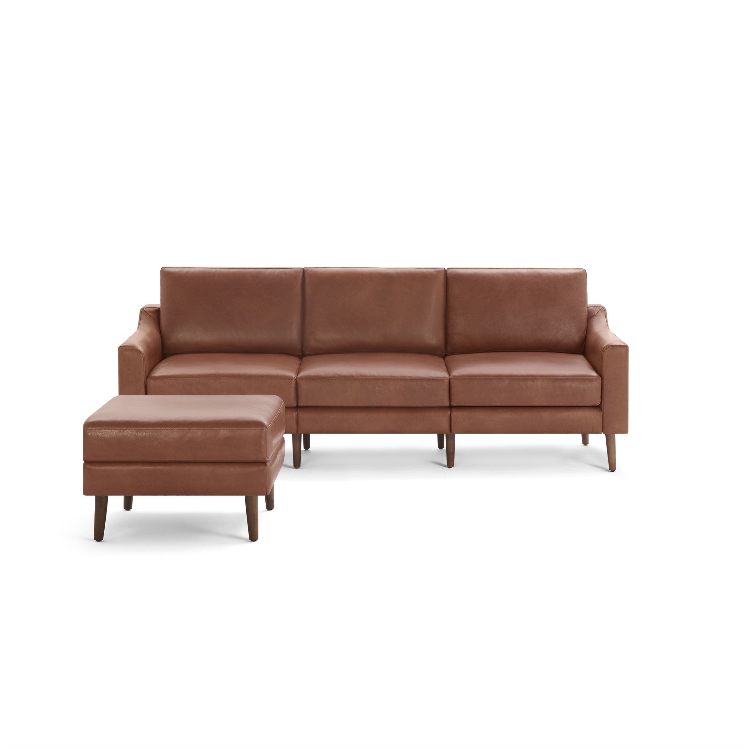 Modern three-seat brown leather sofa with matching ottoman, featuring clean lines and wooden legs.