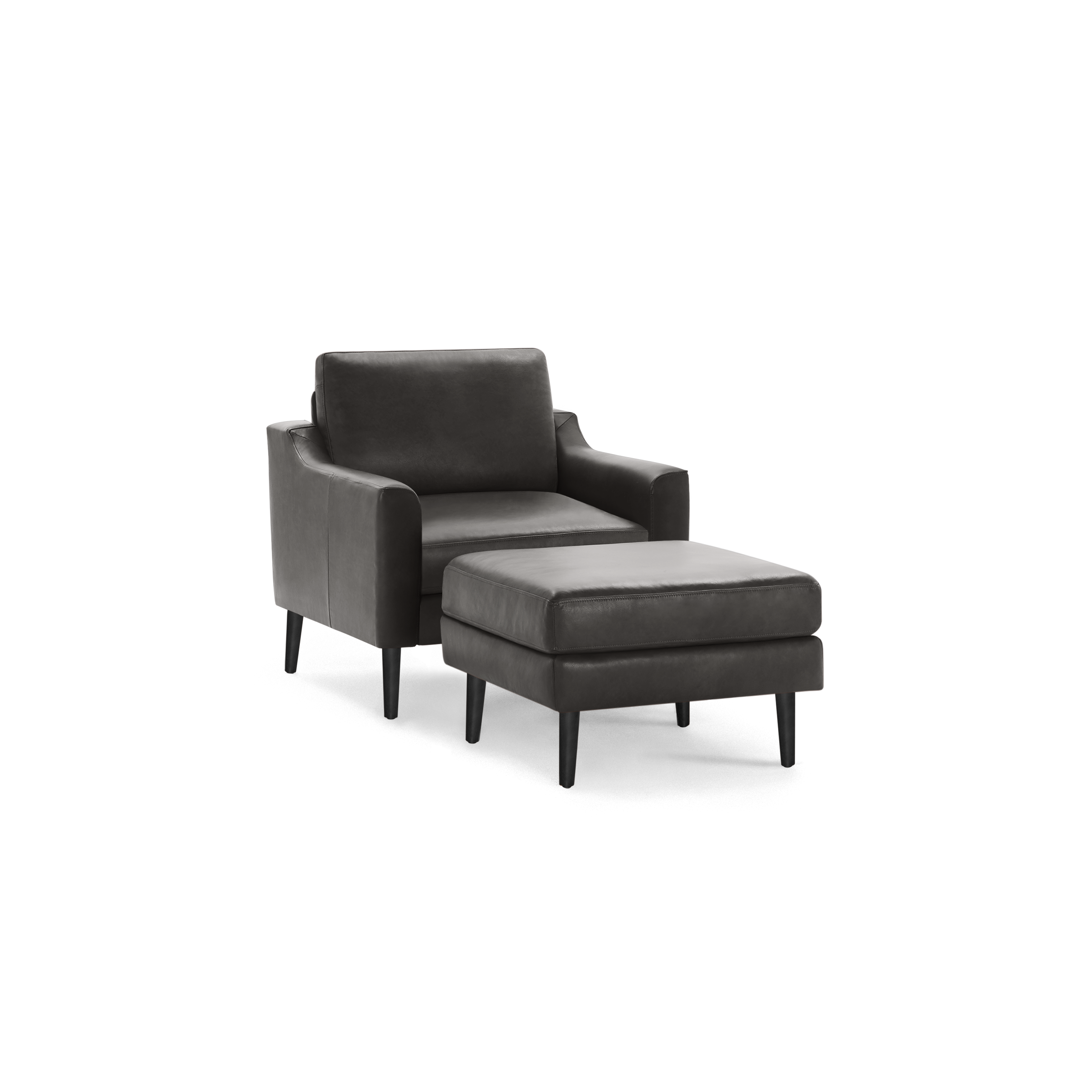 Dark gray leather armchair with matching ottoman, both featuring black tapered wooden legs and modern clean lines.