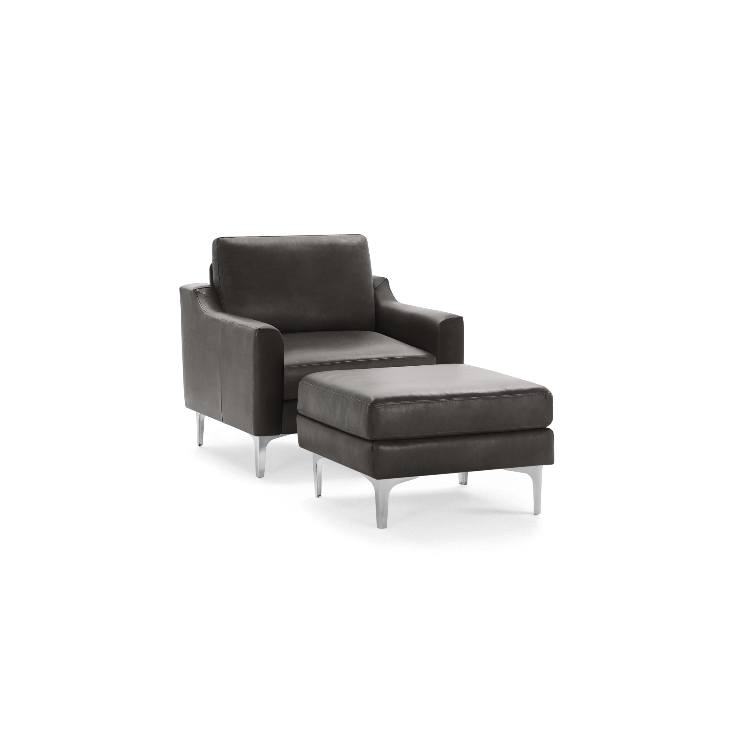 Dark gray leather armchair with matching ottoman, both featuring sleek metal legs and modern design.