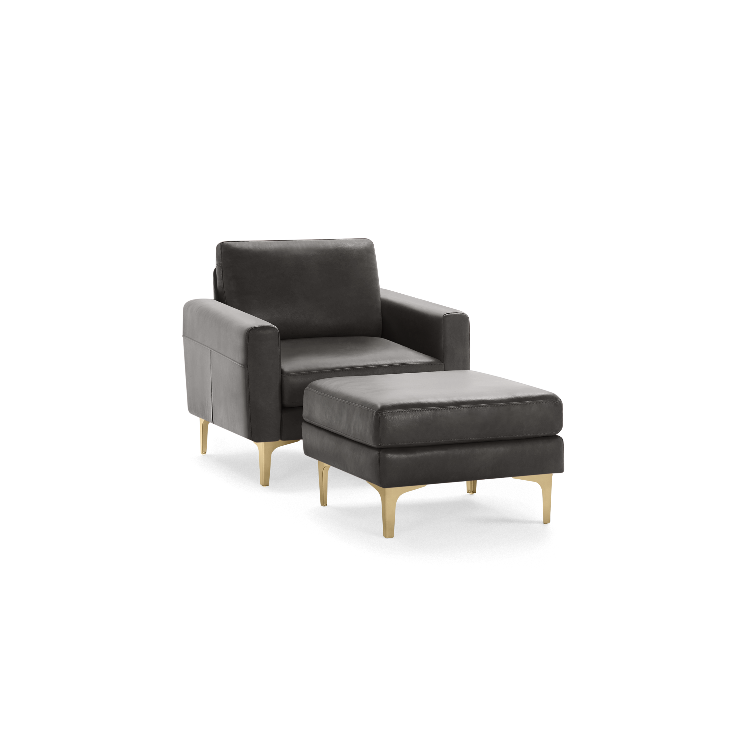 Modern dark gray leather armchair with matching ottoman, featuring sleek gold metal legs and clean lines.