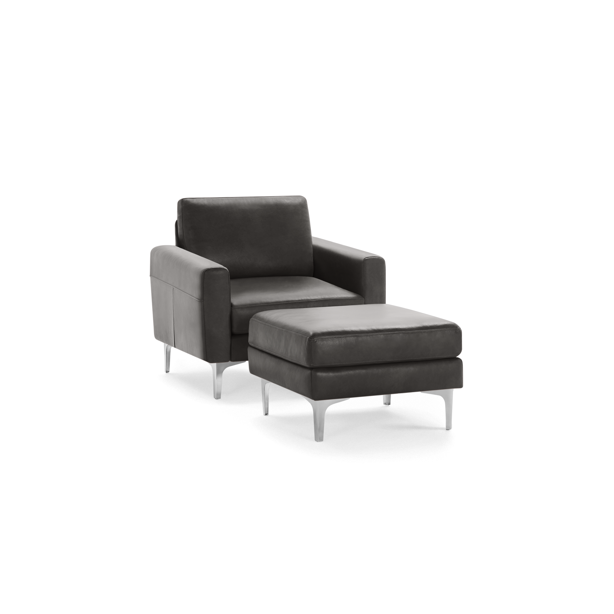 Dark gray leather armchair with matching ottoman, featuring clean lines and modern silver metal legs.