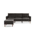 Dark brown leather three-seater sofa with a matching ottoman, featuring wooden legs and clean, modern design.