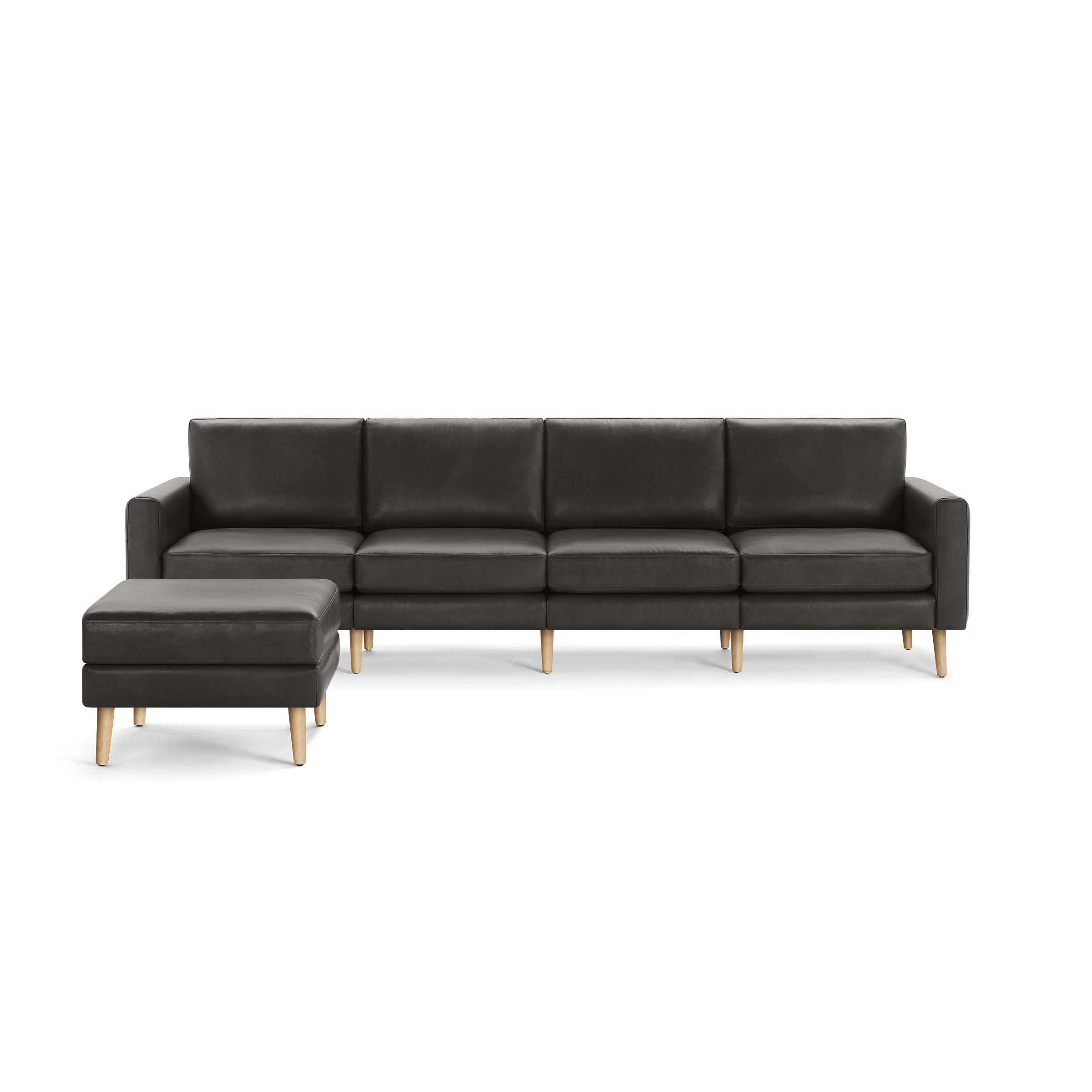 Modern dark gray sectional sofa with wooden legs and matching ottoman, designed for comfort and style.