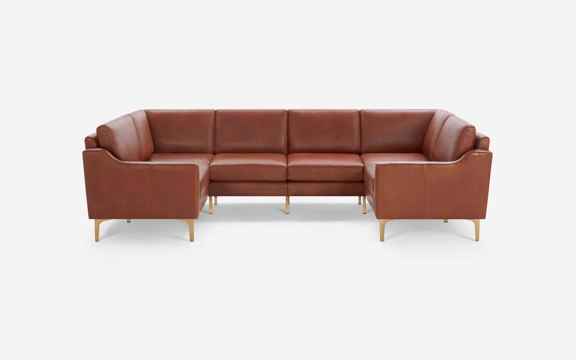 Brown leather U-shaped sectional sofa with clean lines, cushioned seats, and thin gold metal legs on a white background.