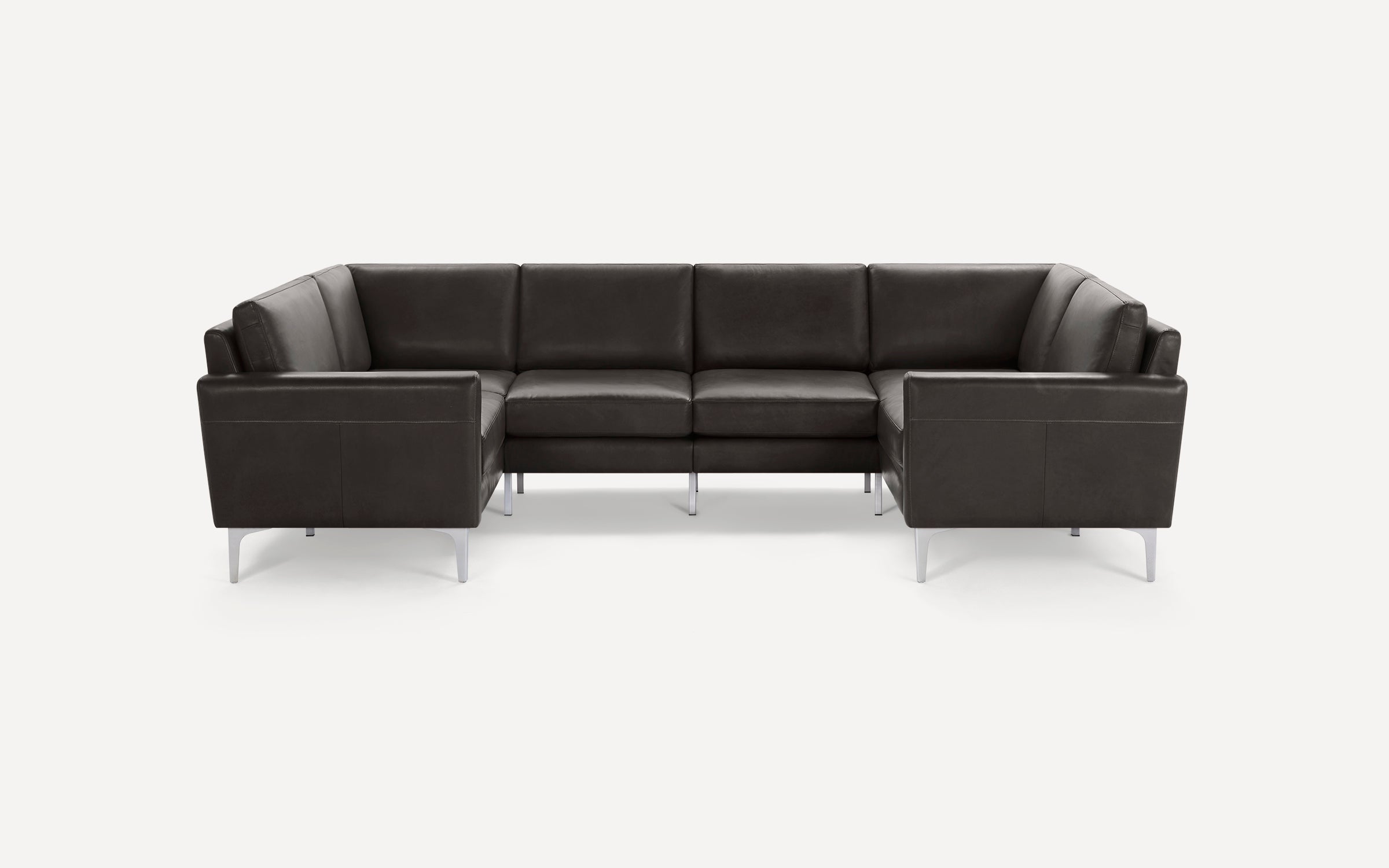 Modern black leather U-shaped sectional sofa with sleek metal legs, clean lines, and comfortable cushioned seating.