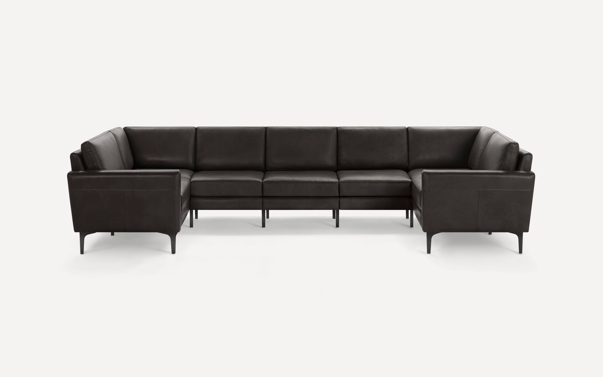 Dark brown leather U-shaped sectional sofa with sleek metal legs and cushioned seats and backrests.