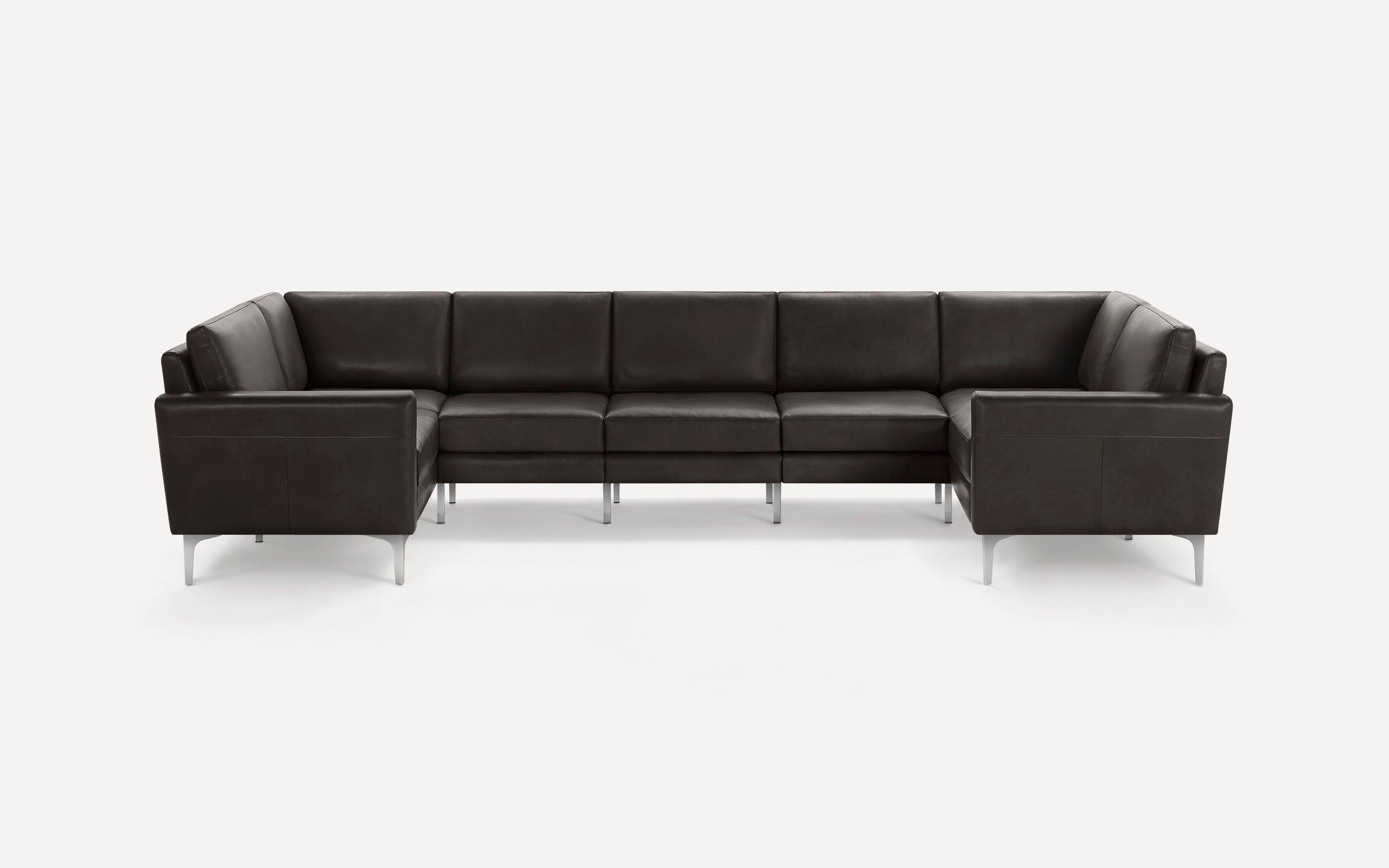 Modern U-shaped sectional sofa in dark brown leather with metal legs, featuring clean lines and plush cushions.
