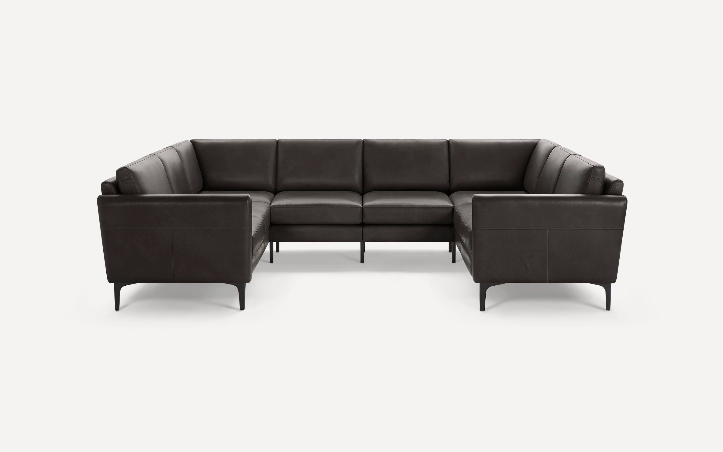 Large modern U-shaped sectional sofa in dark brown leather with clean lines and slim black legs, set against a white background.