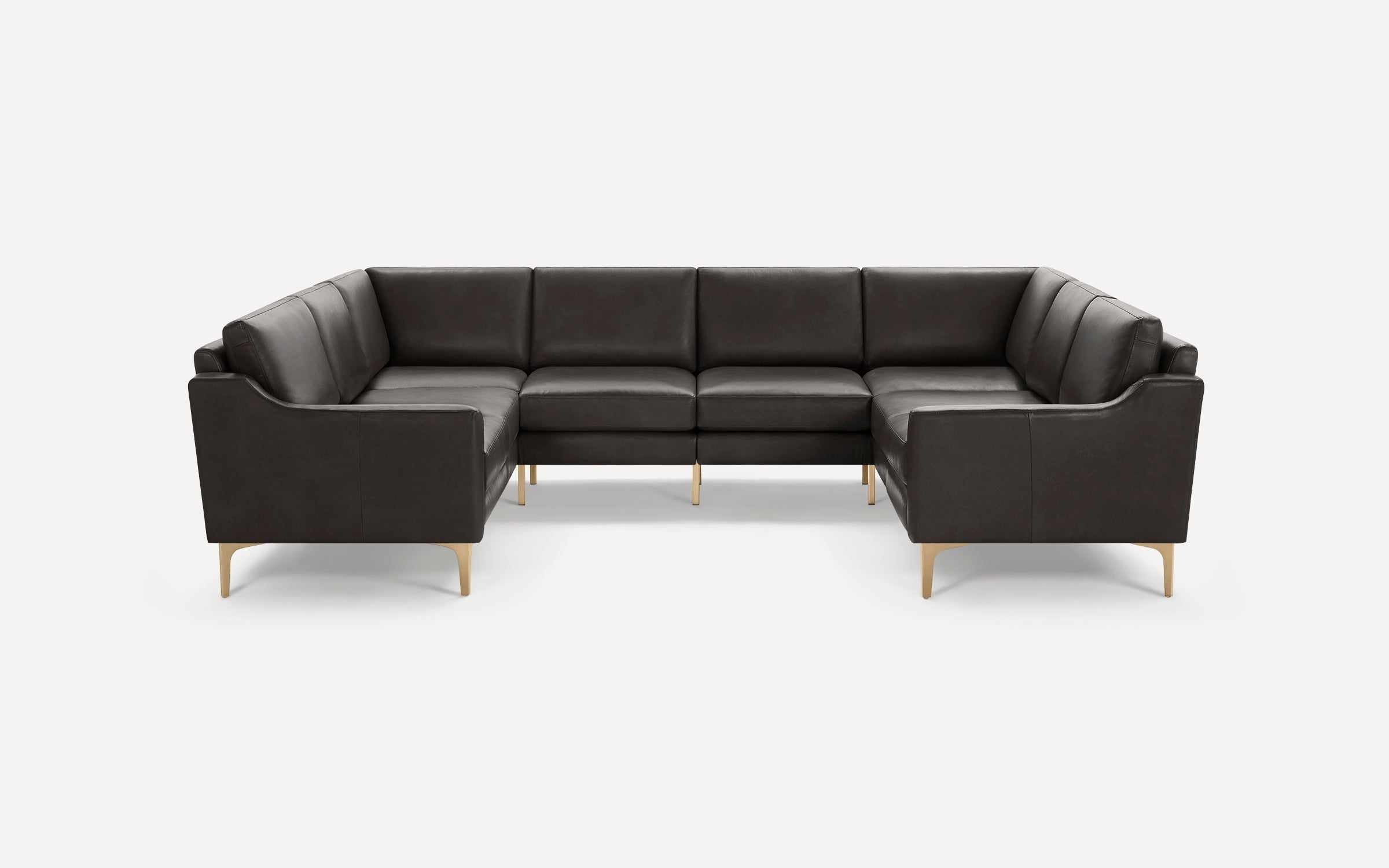 Dark brown leather sectional sofa with clean lines, cushioned seats, angled armrests, and gold metal legs on a white background.