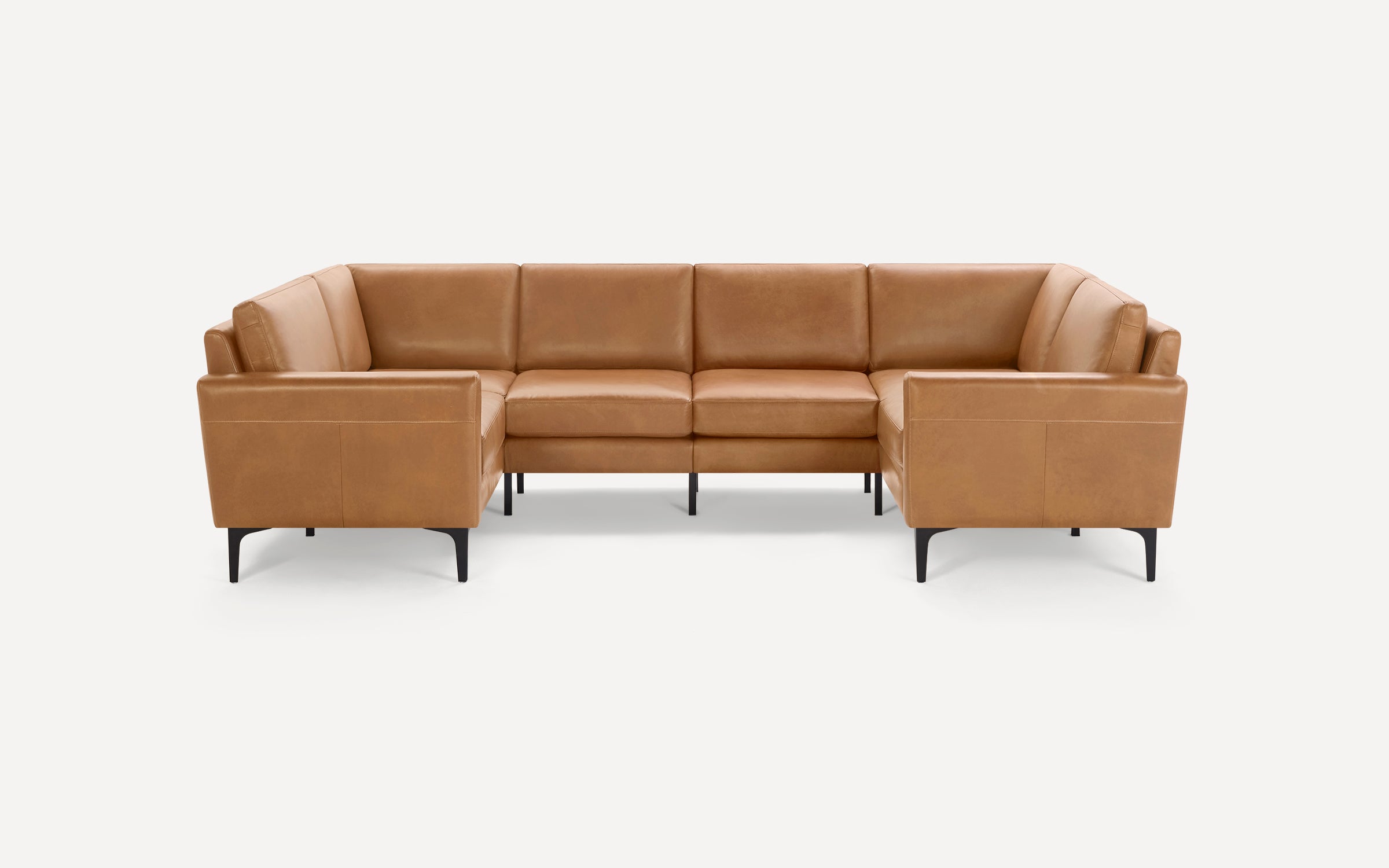 Modern tan leather U-shaped sectional sofa with clean lines, padded cushions, and black metal legs on a white background.
