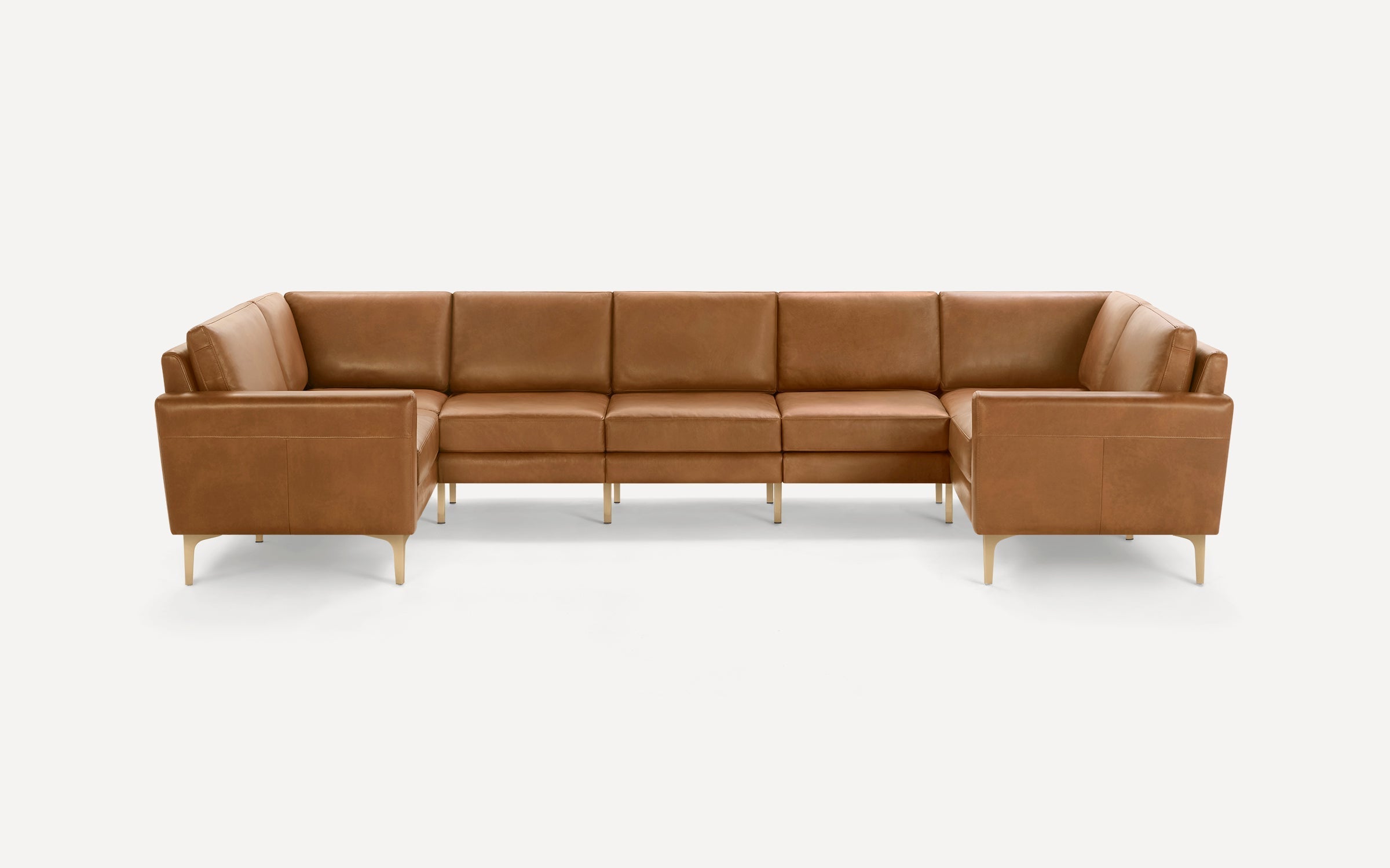 Modern brown leather U-shaped sectional sofa with gold metal legs, featuring clean lines and cushioned seats and backs.